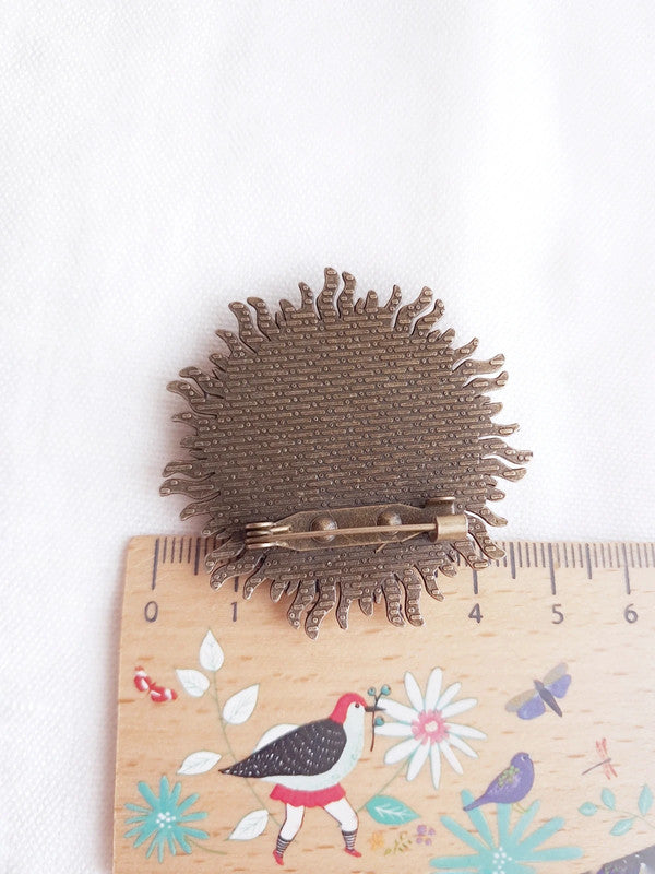 Broche soleil autoportrait de Van Gogh