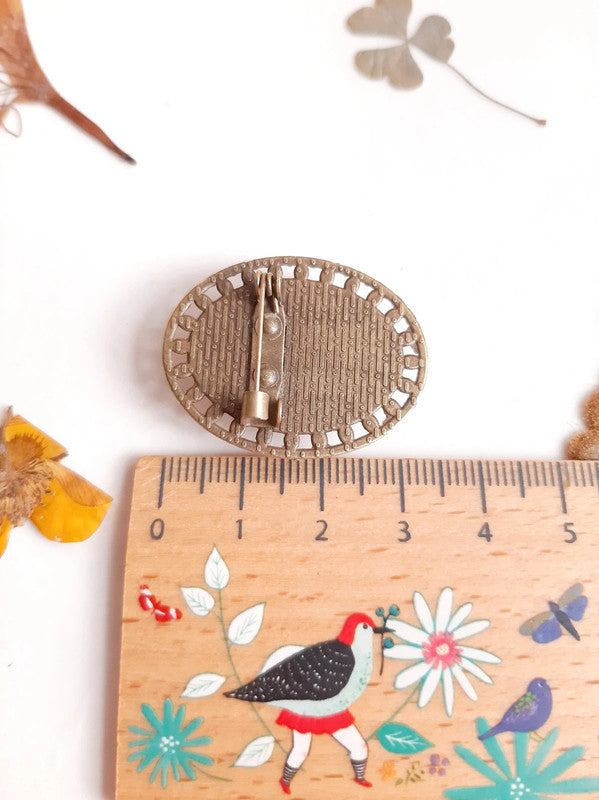 Broche ovale en agate jaune