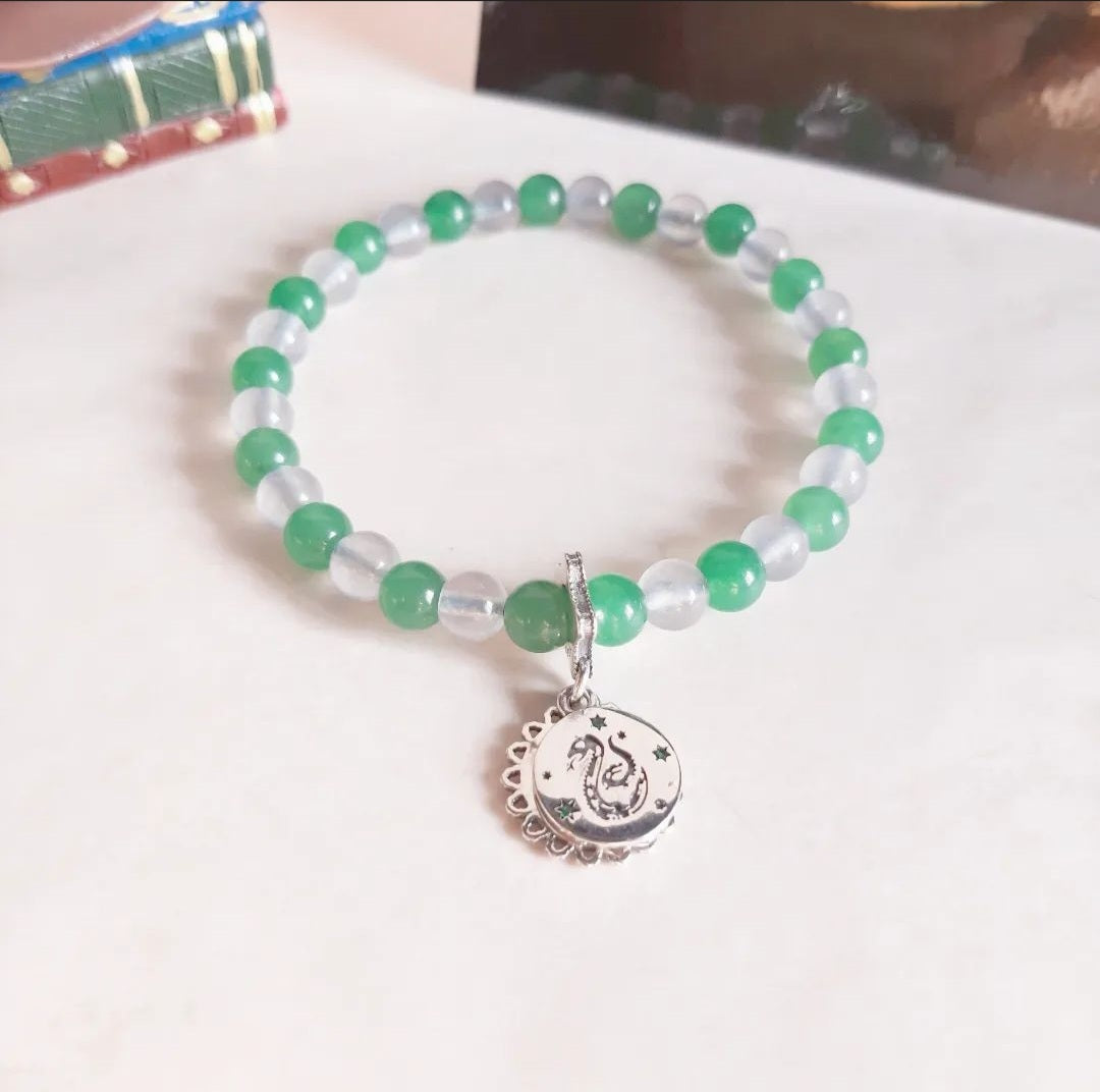 Slytherin bracelet with its charm