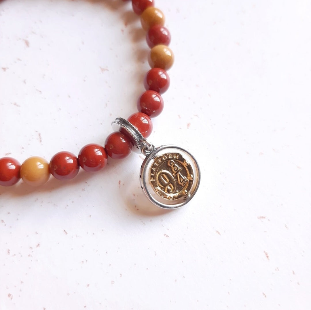 9 ¾ bracelet with its charm