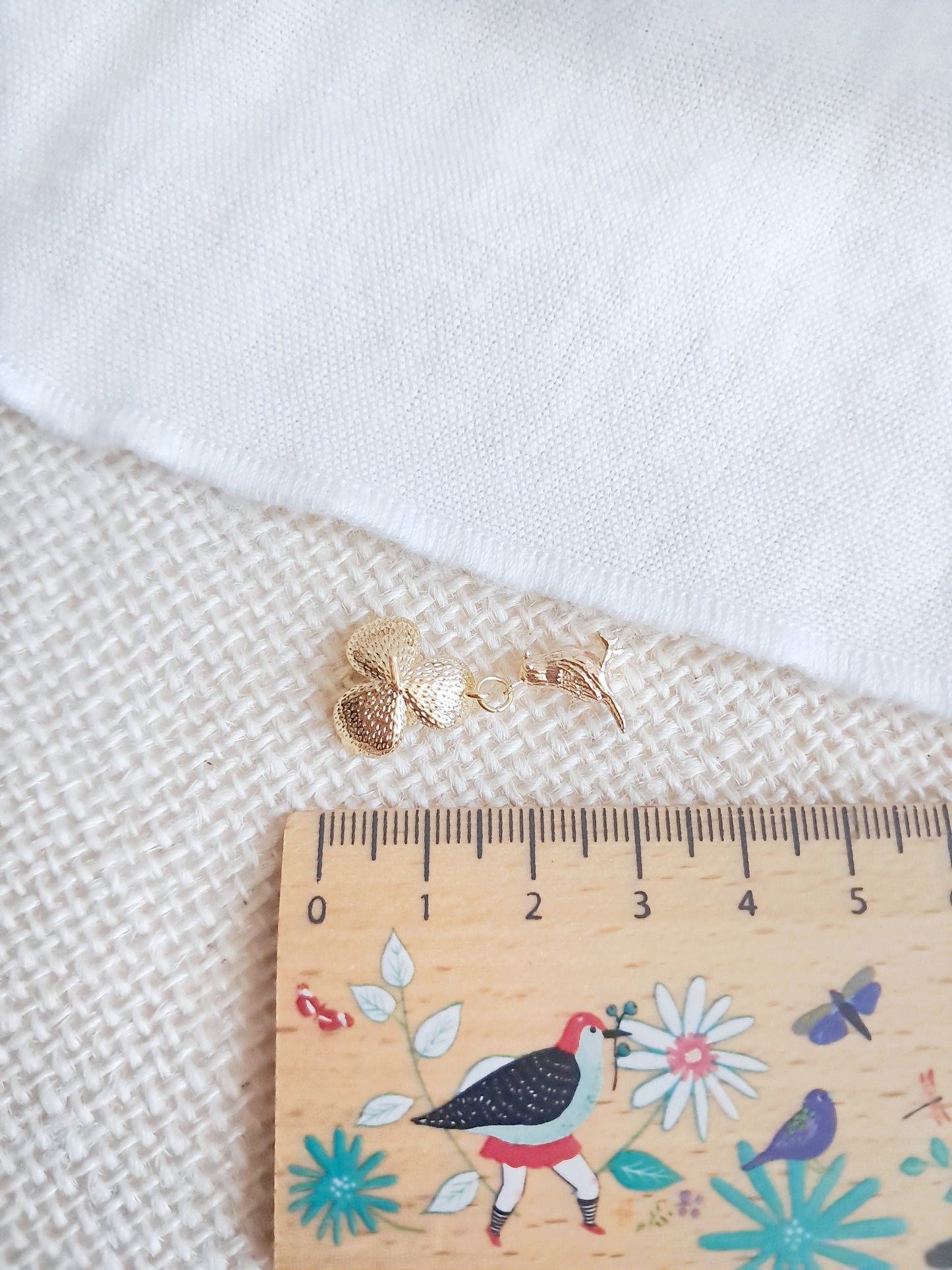 Boucles d'oreilles fleurs et oiseaux en laiton