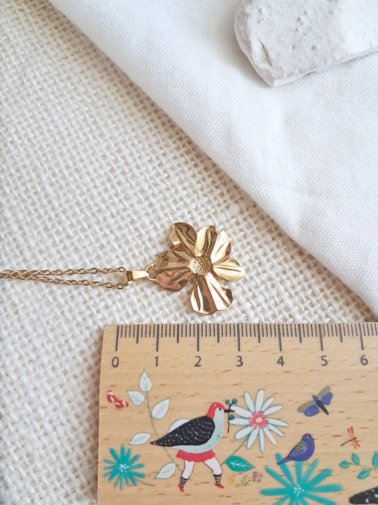 Collier fleur tendance en acier inoxydable doré