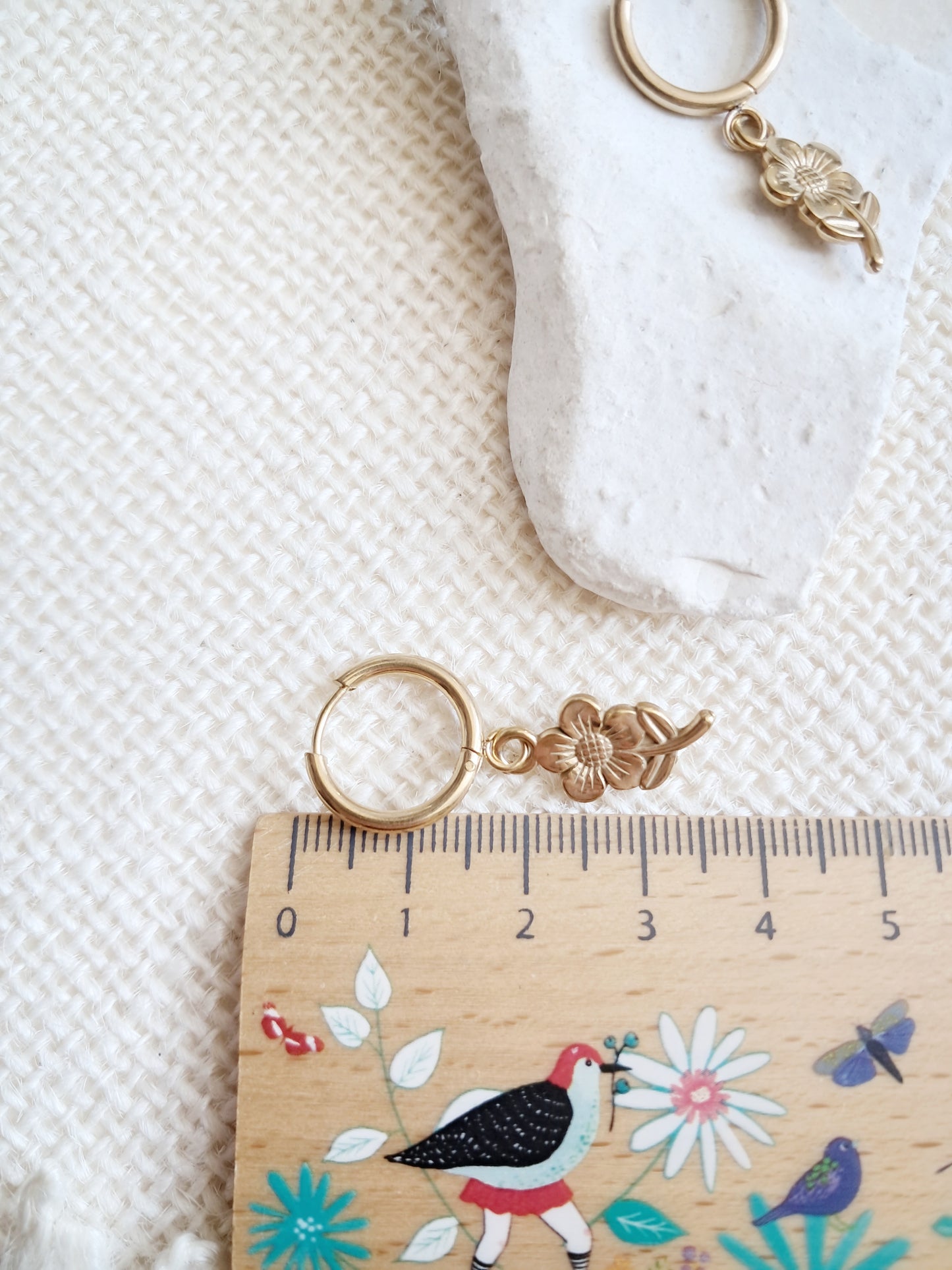 Boucles d'oreilles créoles fleurs en acier inoxydable doré