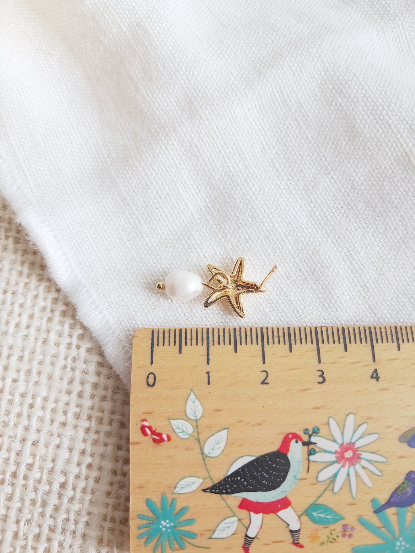 Boucles d'oreilles pendantes étoiles de mer et perles d'eau douce