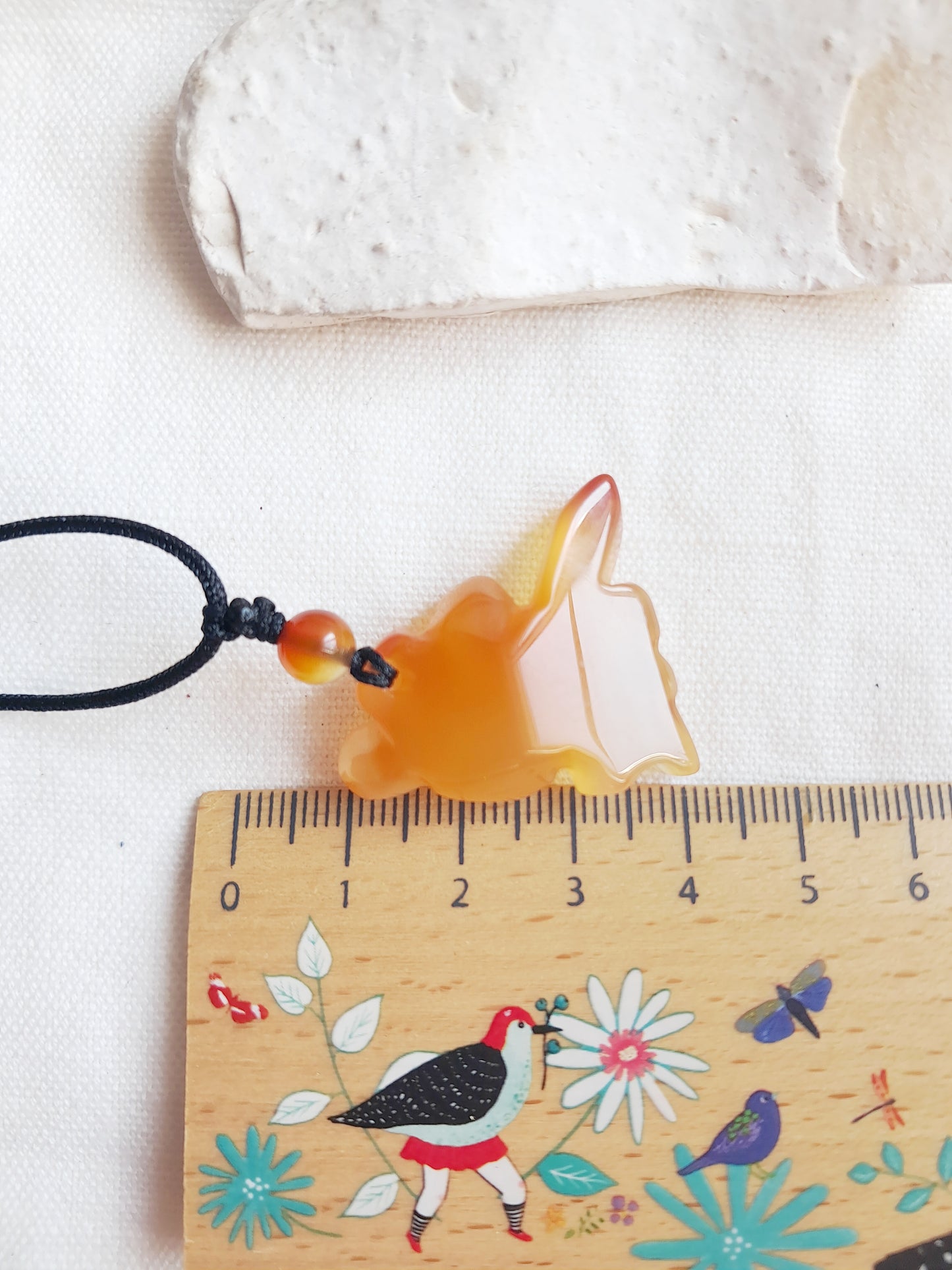 Collier poisson en agate orange