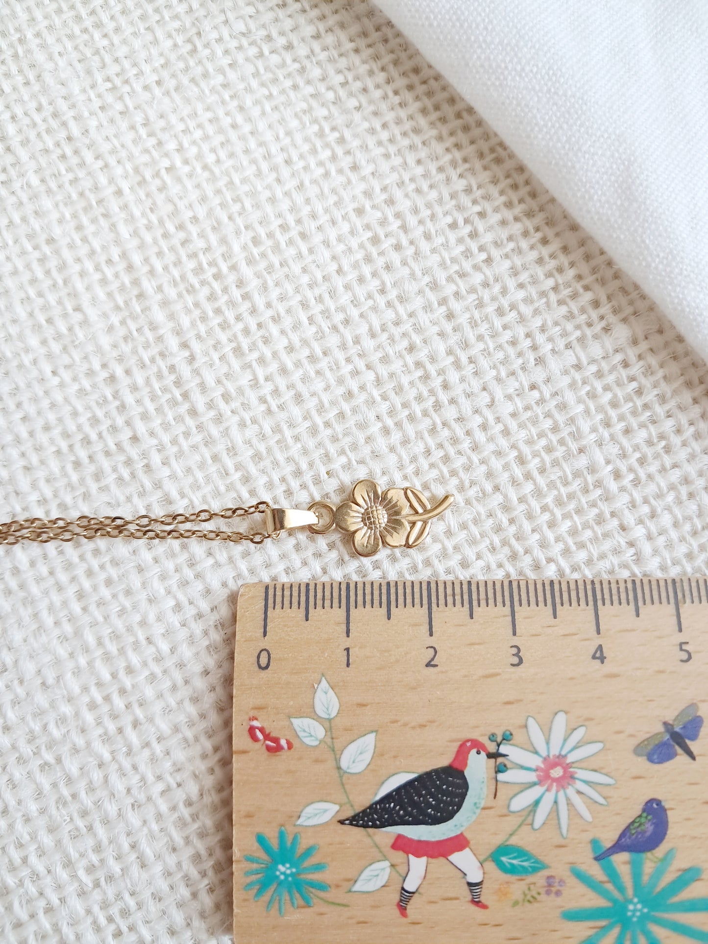 Collier pendentif fleur en acier inoxydable