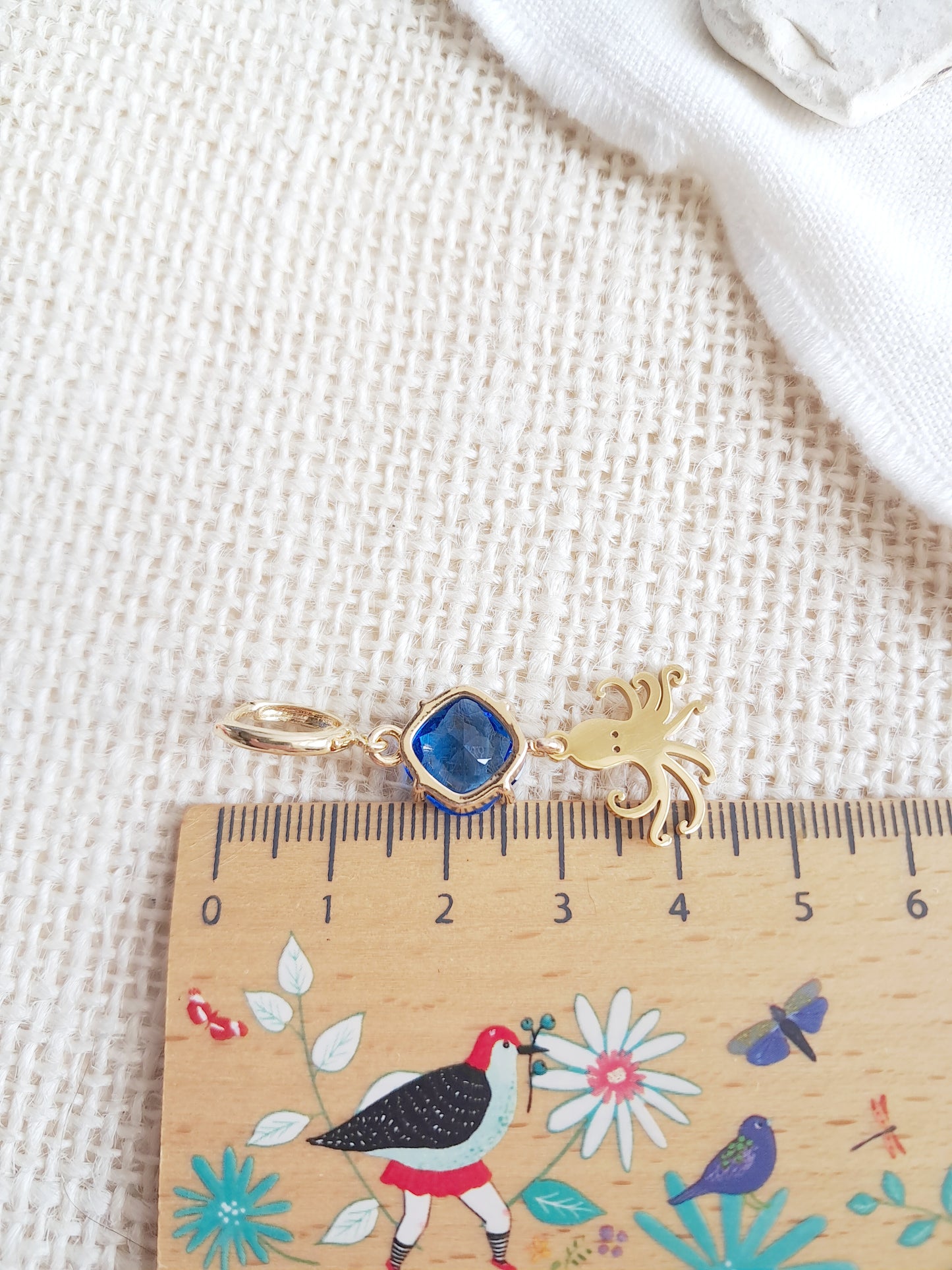 Boucles d'oreilles créoles clips pieuvres et gemmes bleues