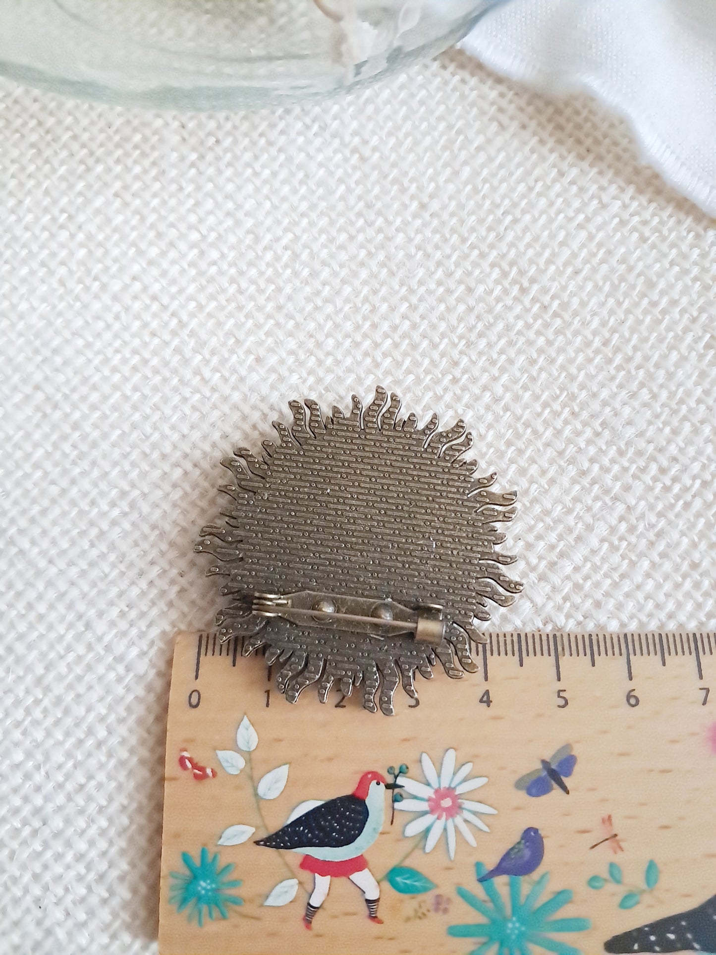 Broche soleil toucan