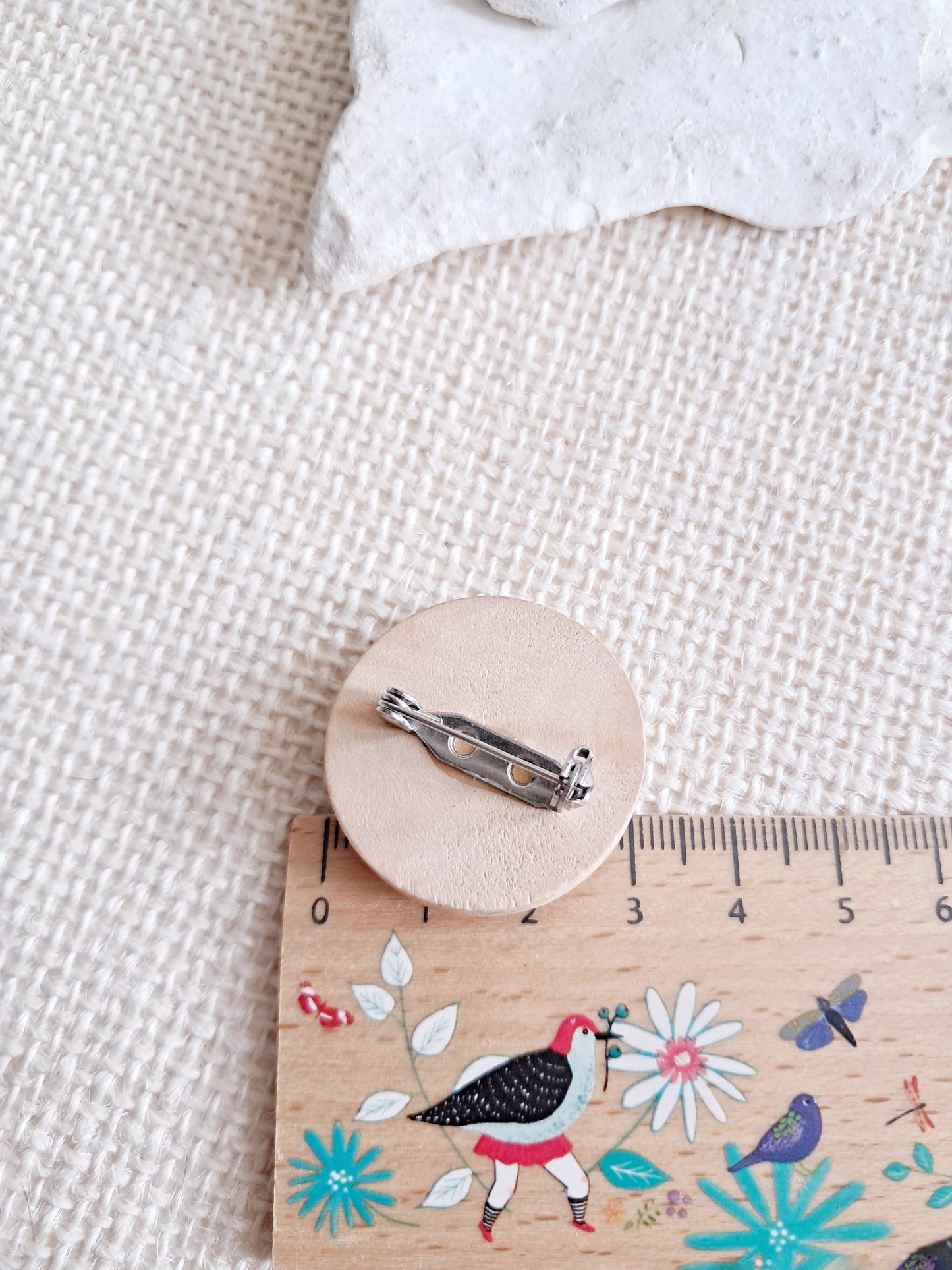 Broche cabochon oiseau paon