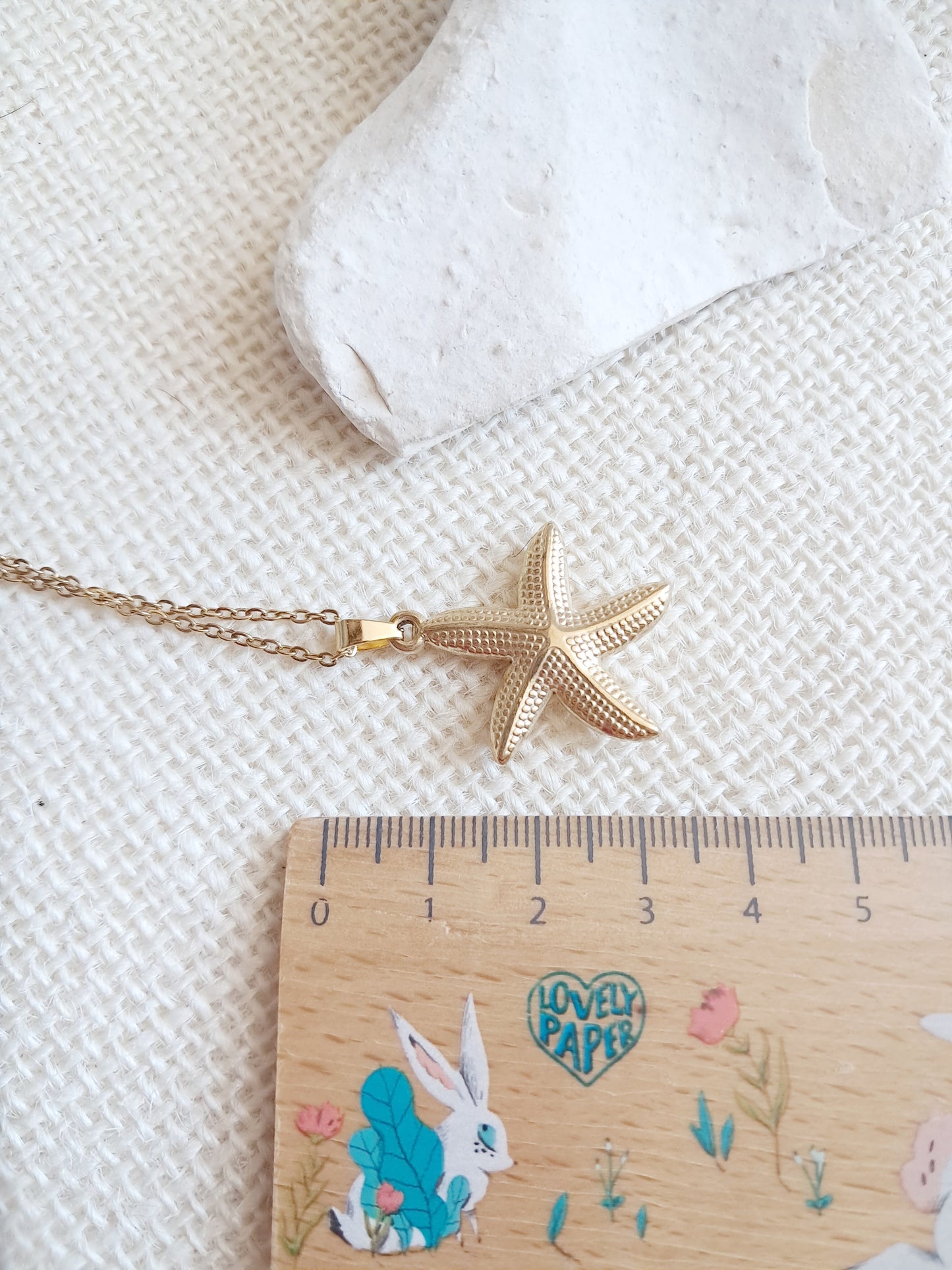 Collier pendentif étoile de mer en acier inoxydable doré