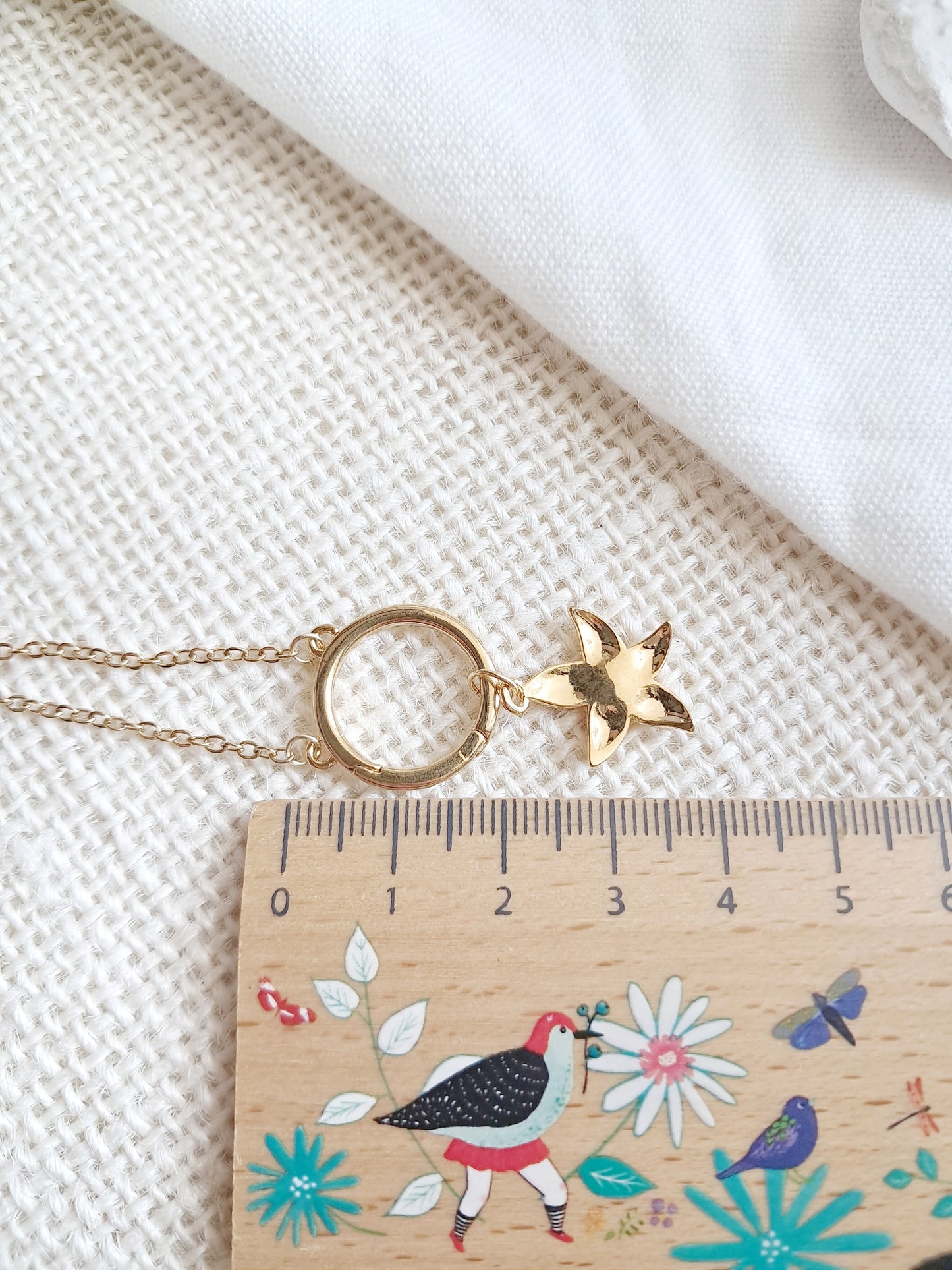 Collier anneau étoile de mer en acier inoxydable doré