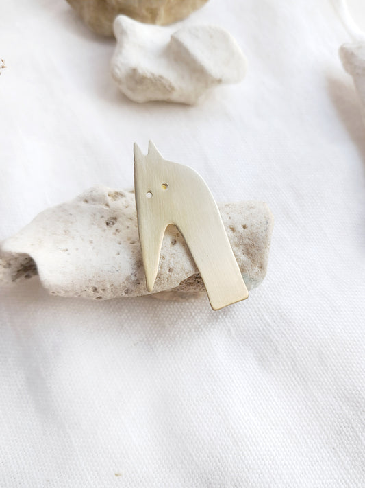 Pin's tête de loup en laiton brut 