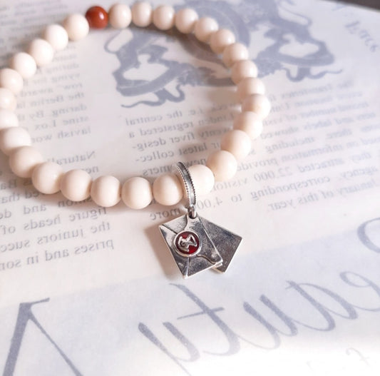 Bracelet la lettre d'admission à Poudlard avec sa breloque