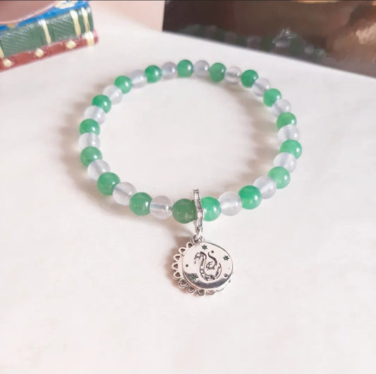 Slytherin bracelet with its charm