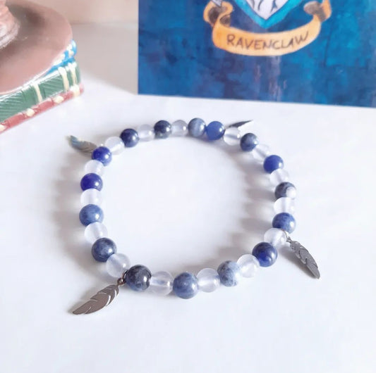 Bracelet Serdaigle avec ses breloques plumes