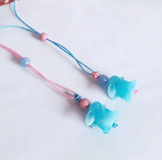 Collier patronus lapin de Luna Lovegood