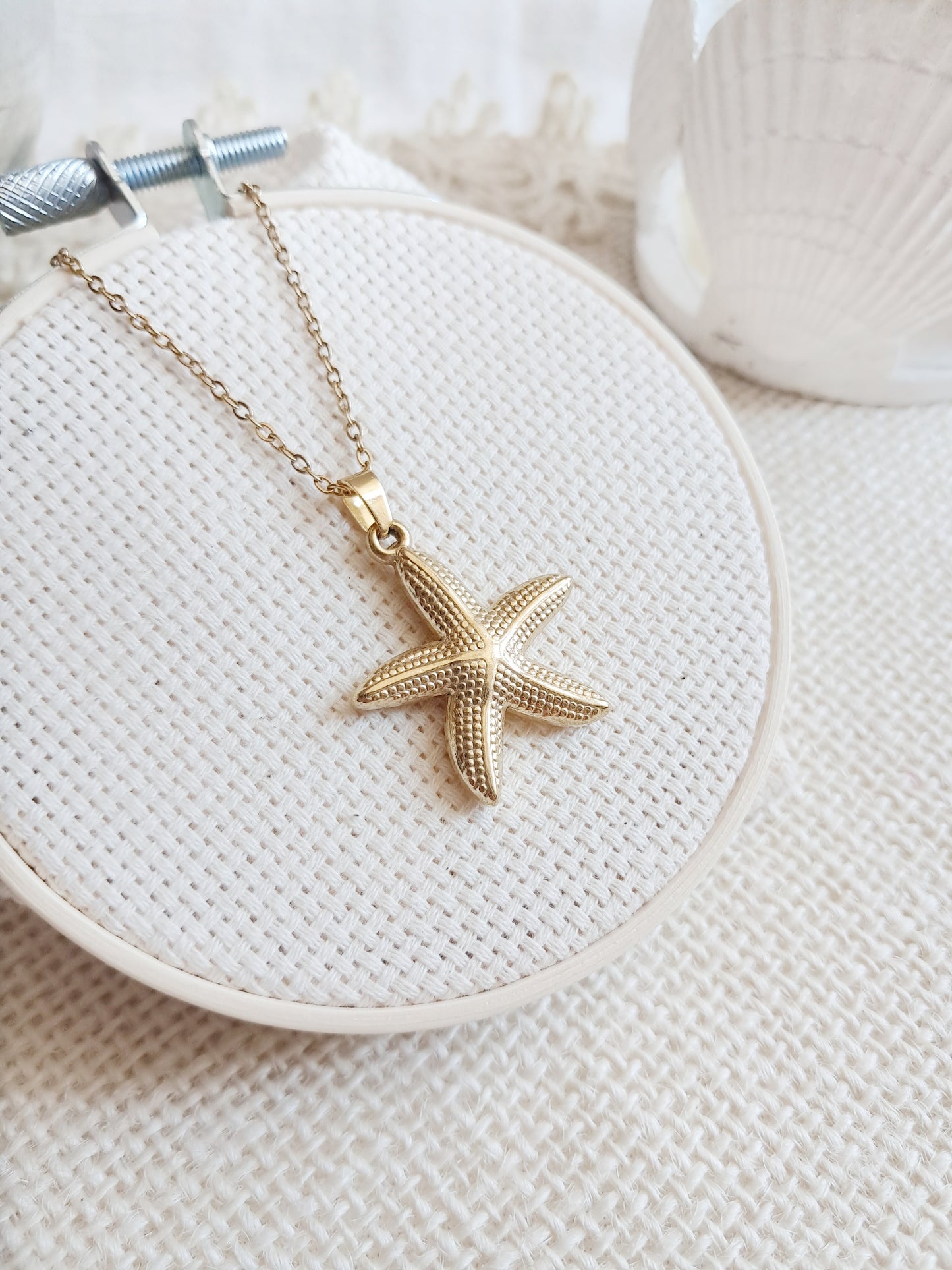 Collier pendentif étoile de mer en acier inoxydable doré