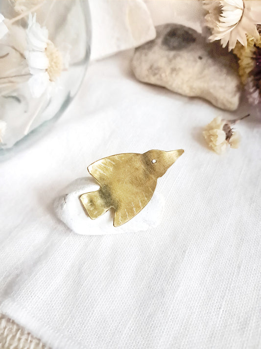 Pin's oiseau fuselé en laiton