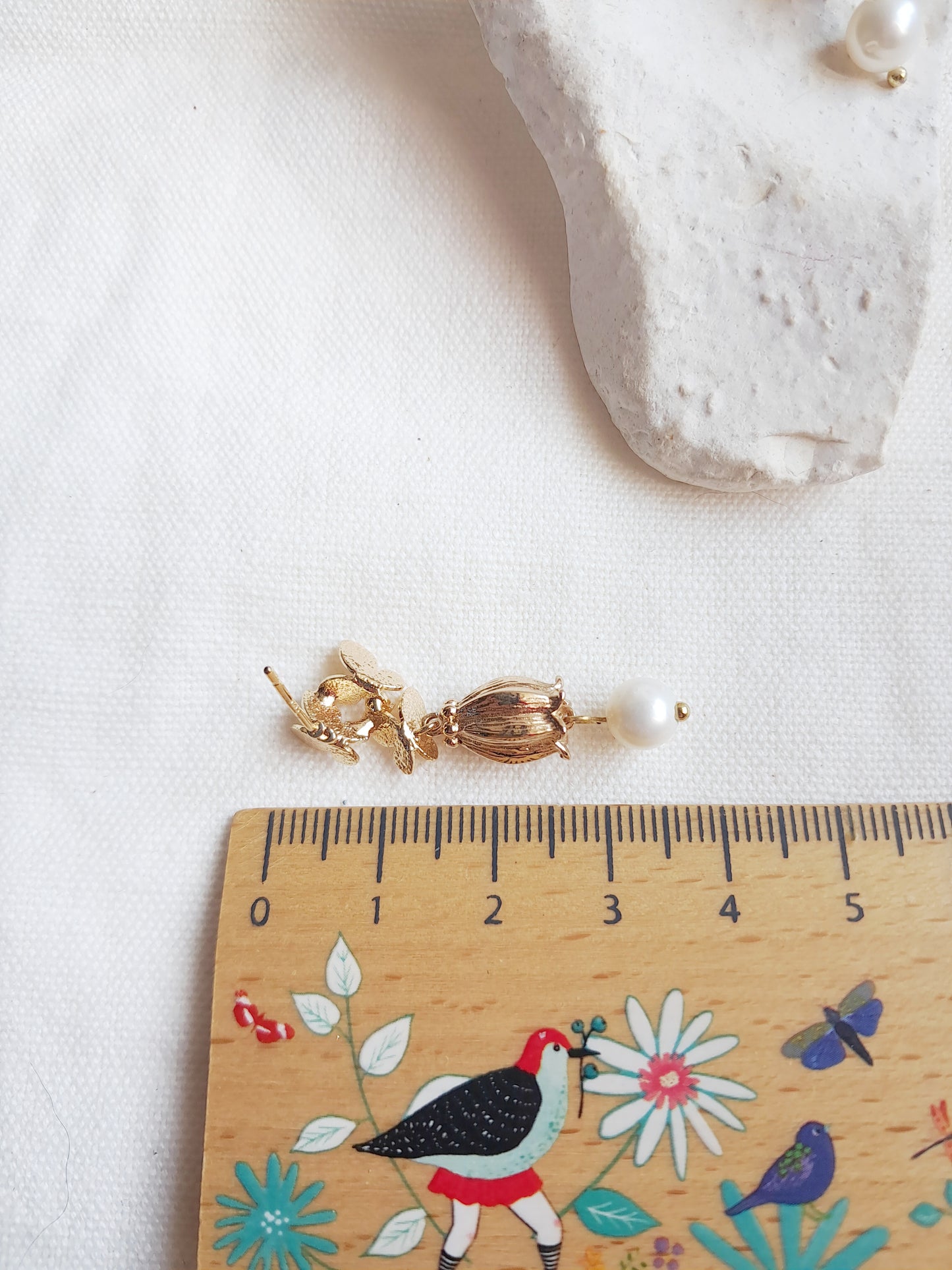 Boucles d'oreilles pendantes papillons et fleur