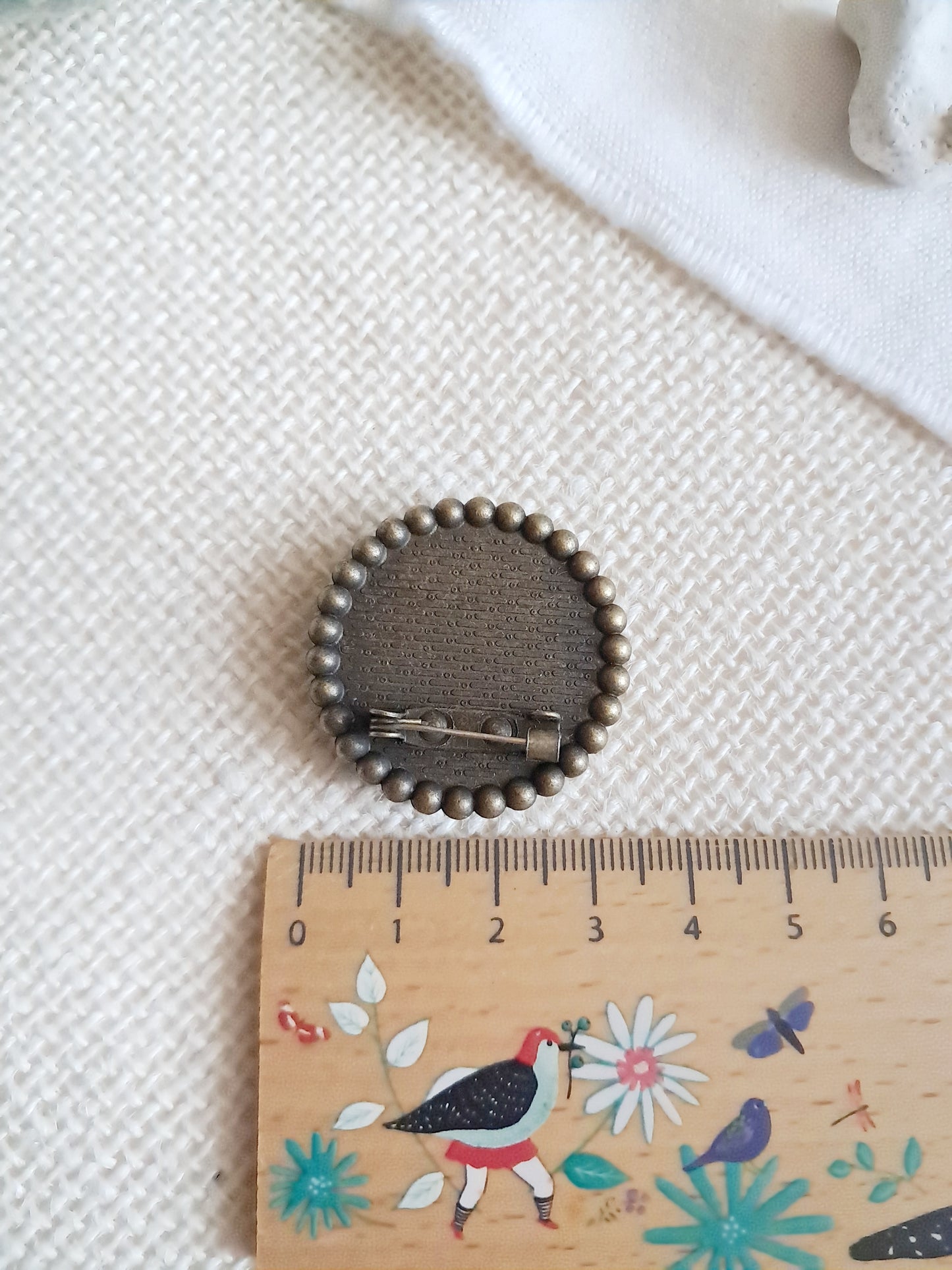 Broche cabochon vache et tournesols