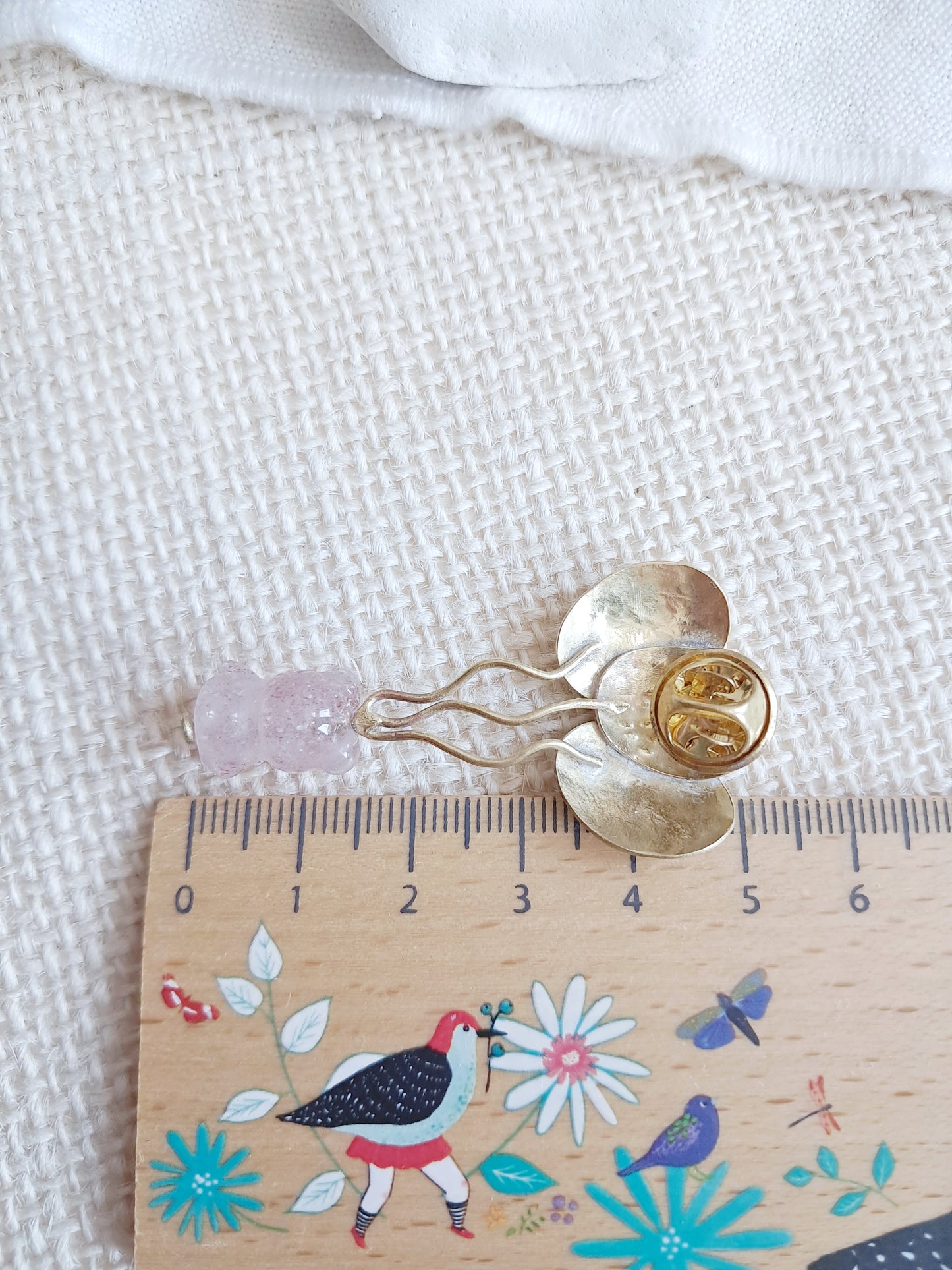 Pin's nounours suspendu à des ballons en quartz fraise