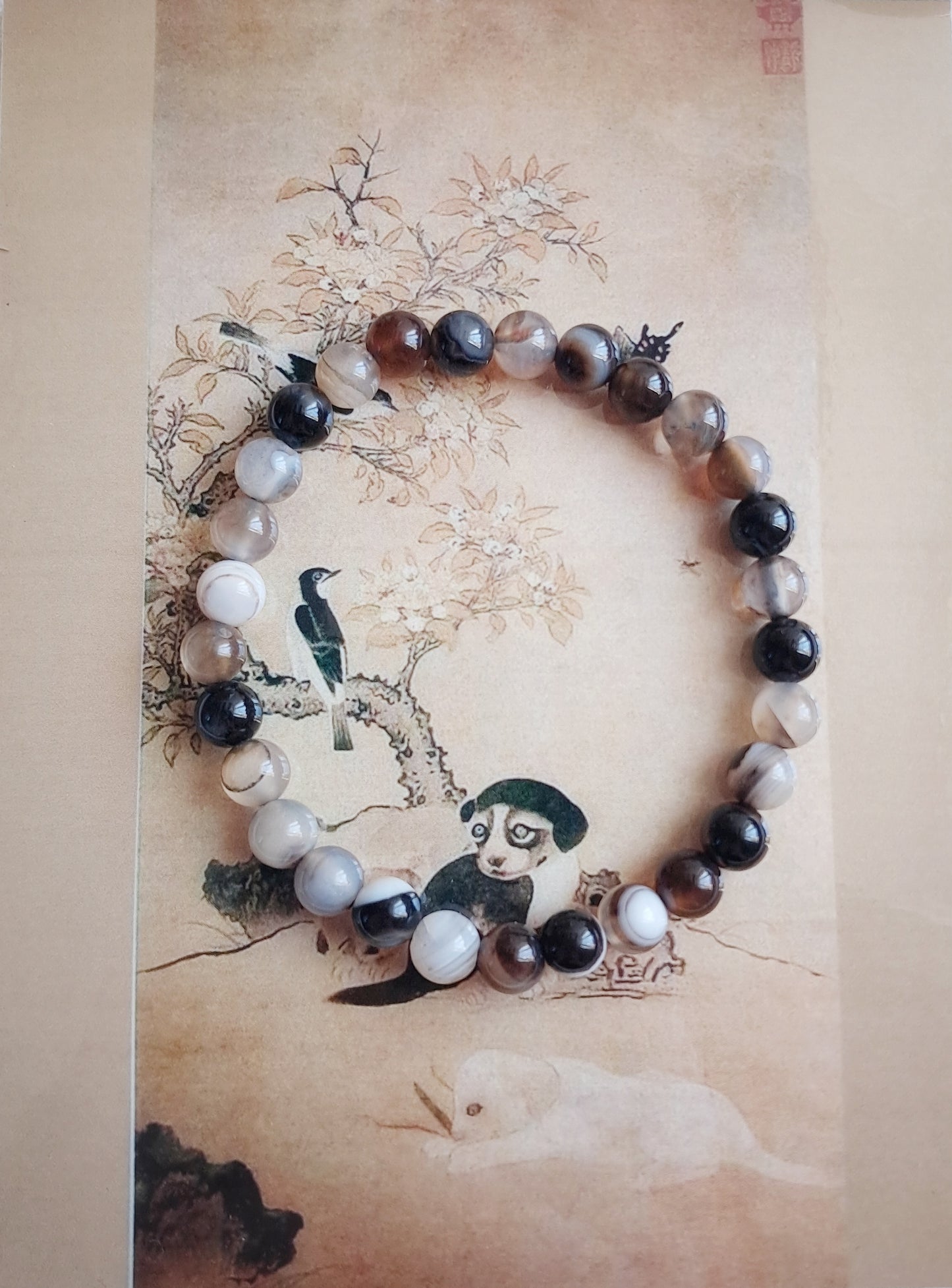 Bracelet « Fleurs et oiseaux dans un jardin » en agate café