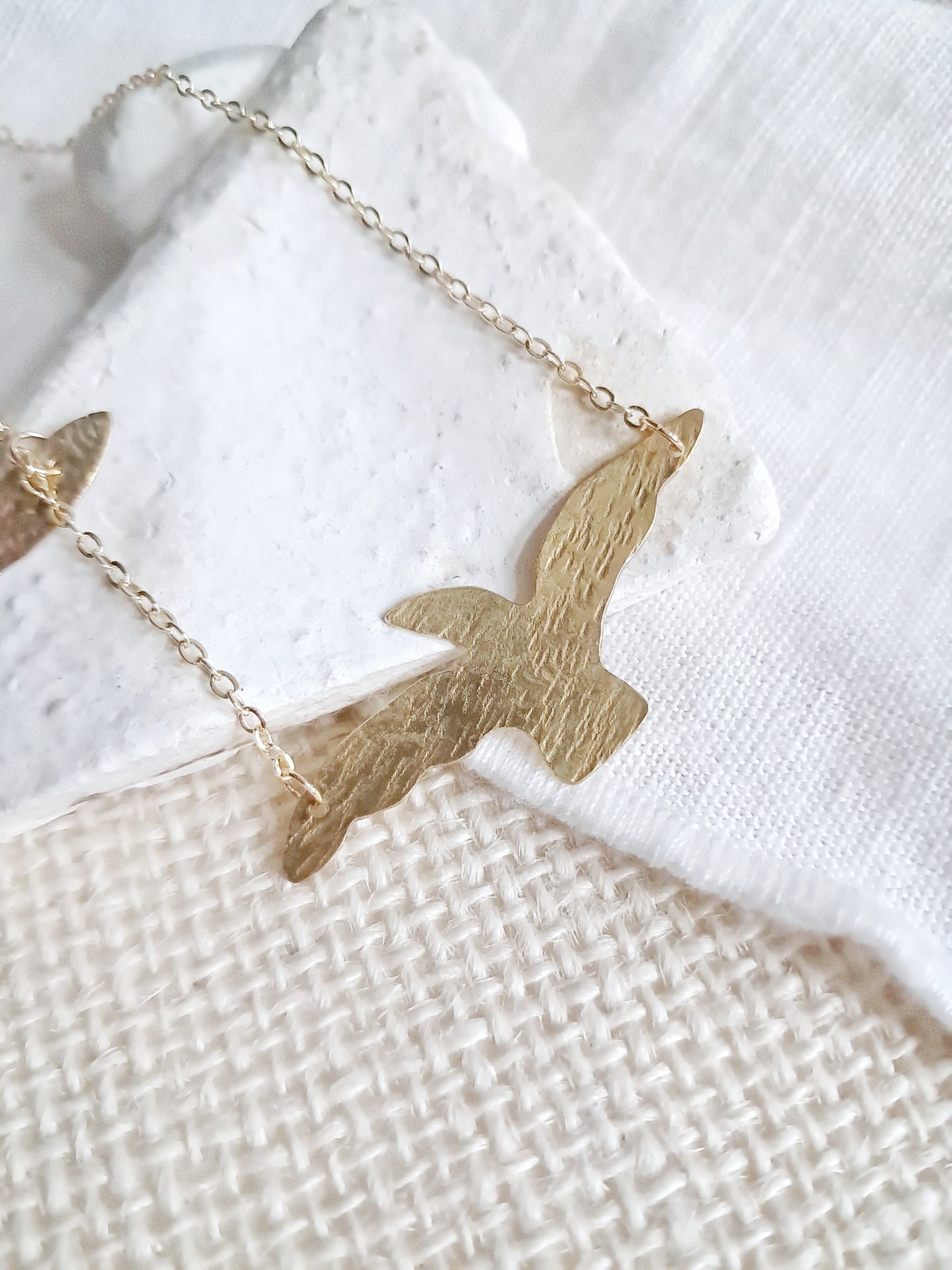 Collier oiseau et poisson en laiton