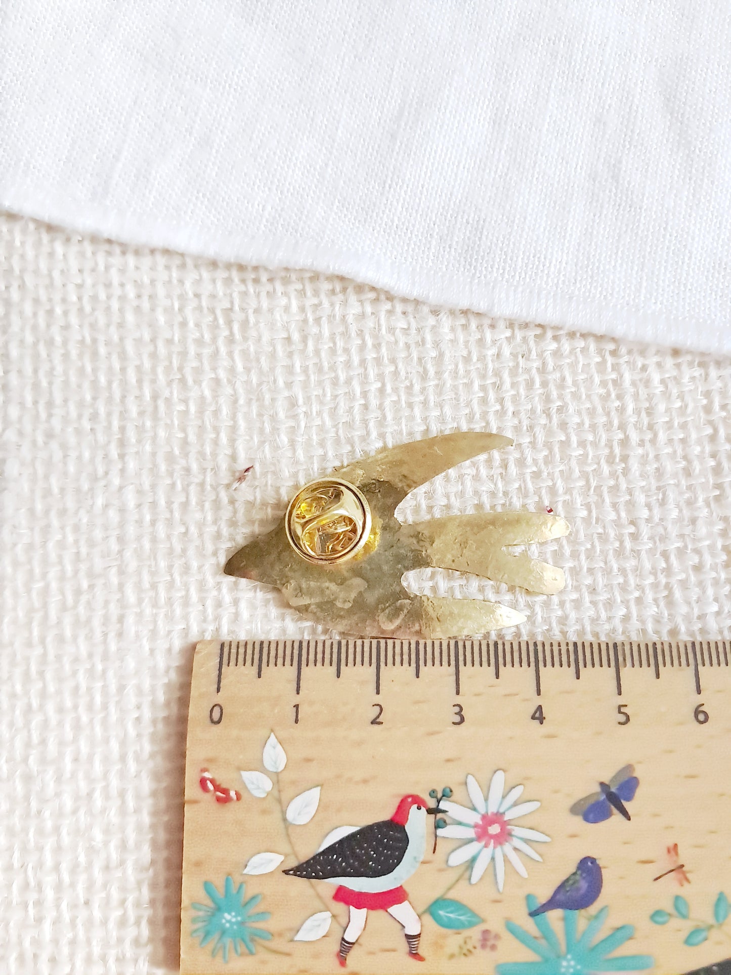 Pin's hirondelle en laiton