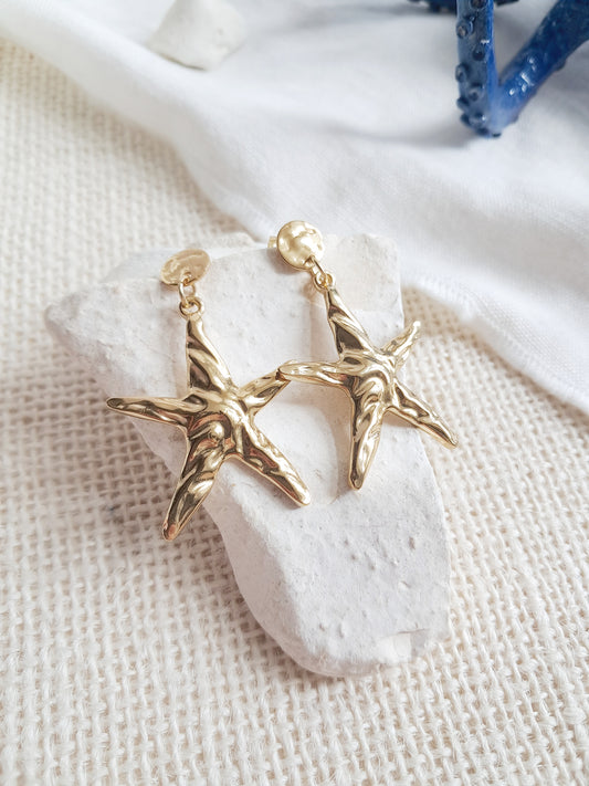 Boucles d'oreilles étoiles de mer texturées en acier inoxydable doré 