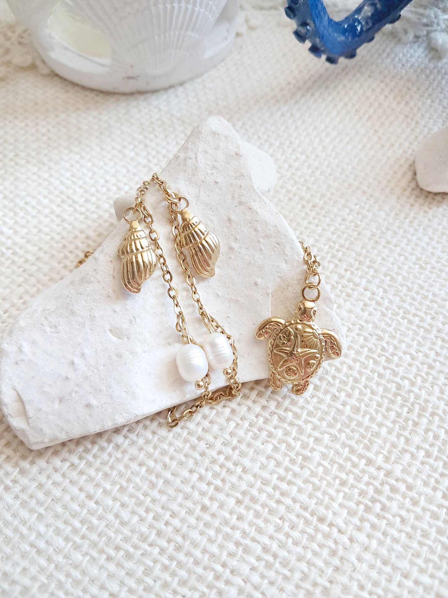 Collier tortue, coquillages et perles d'eau douce