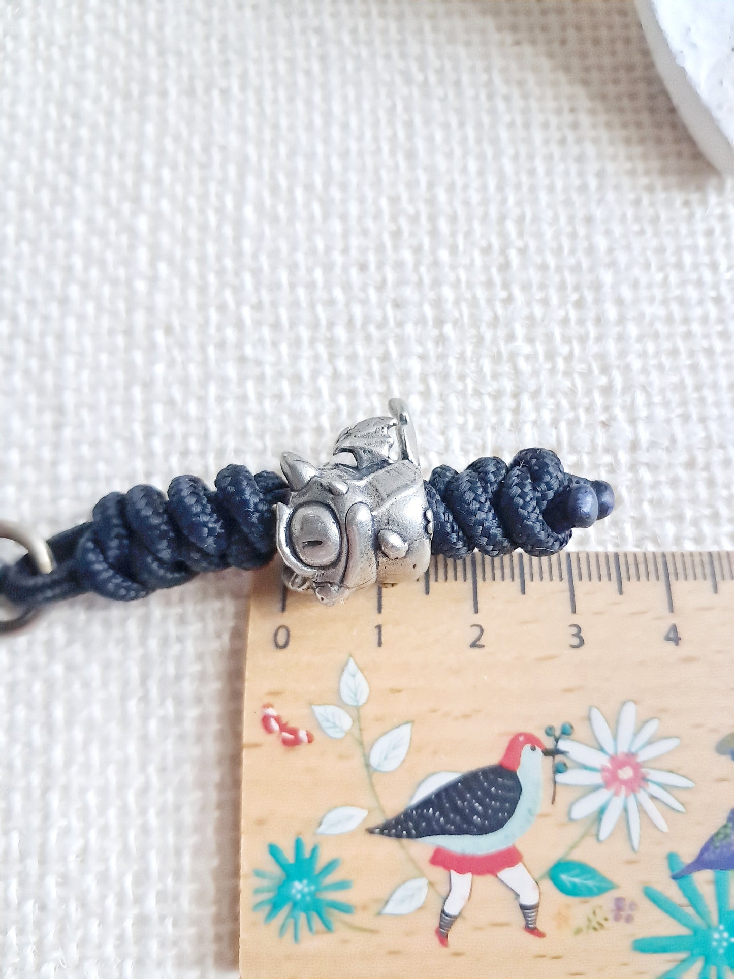 Porte-clés bébé dragon en laiton