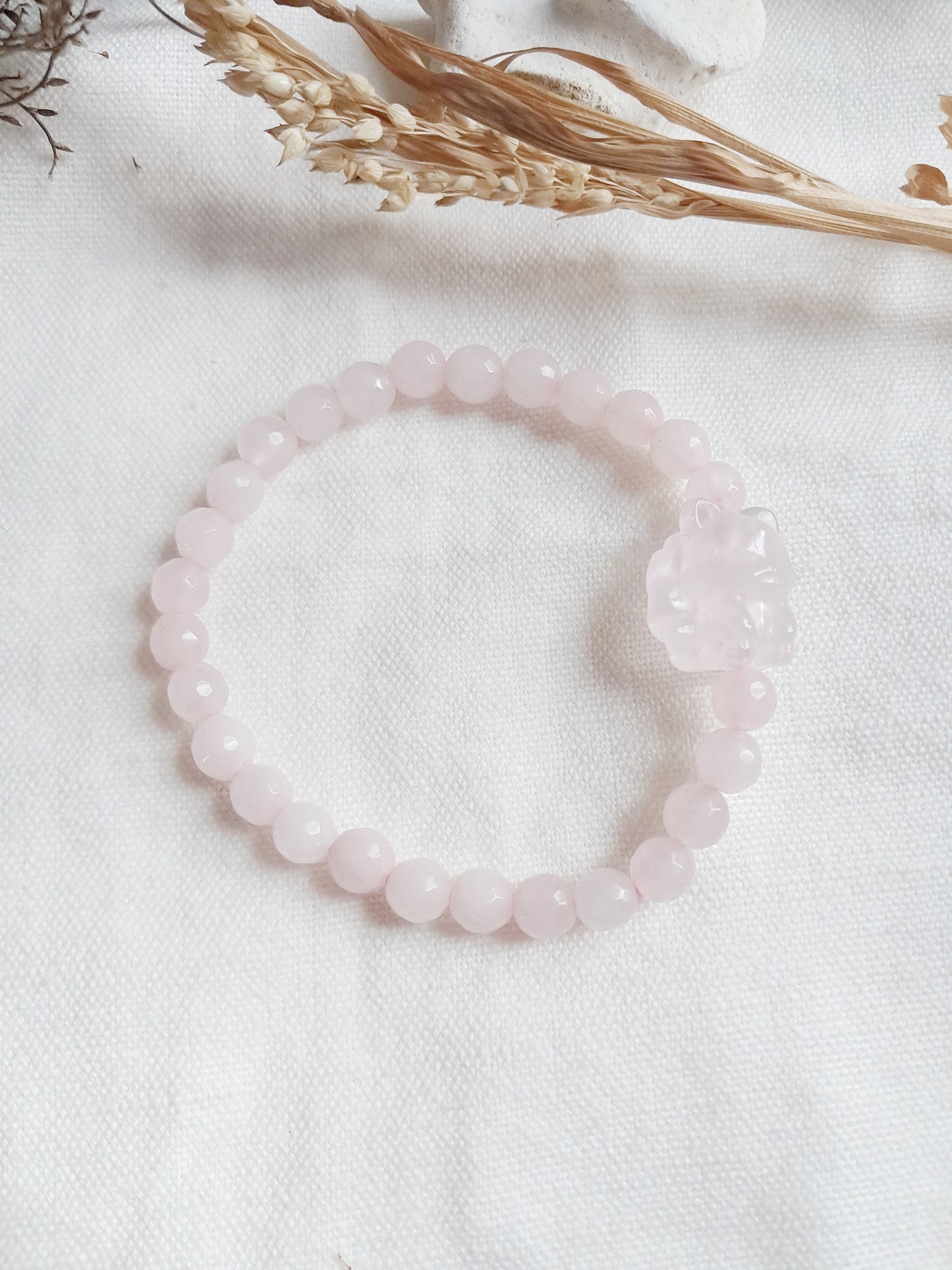 Bracelet renard à neuf queues en quartz rose à facettes