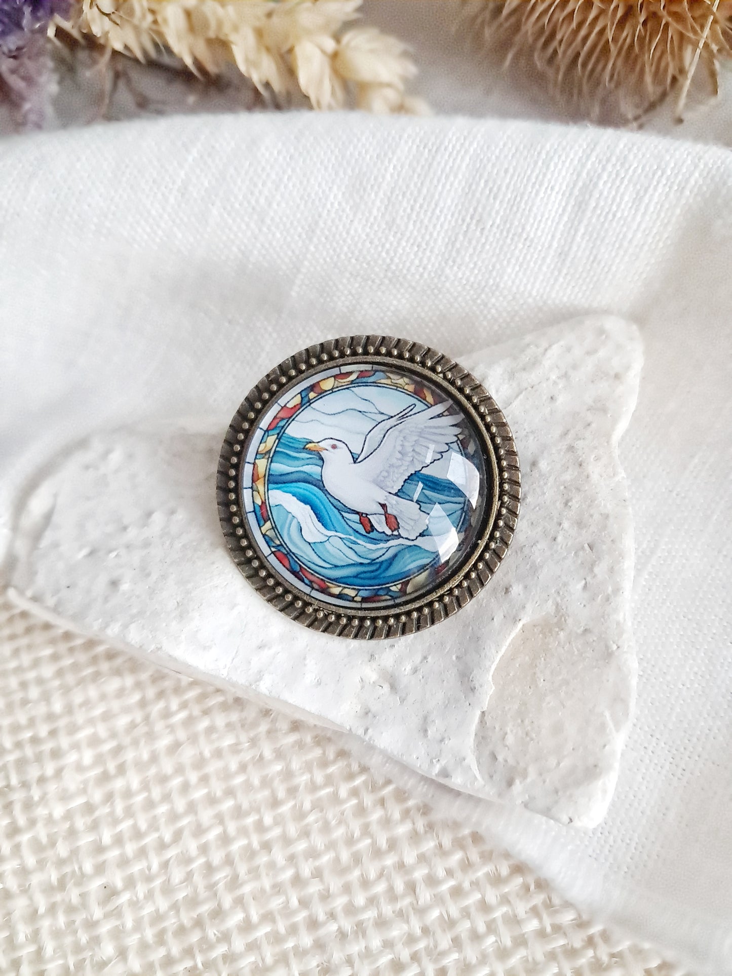 Broche cabochon mouette 