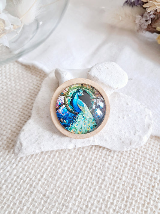 Broche cabochon oiseau paon