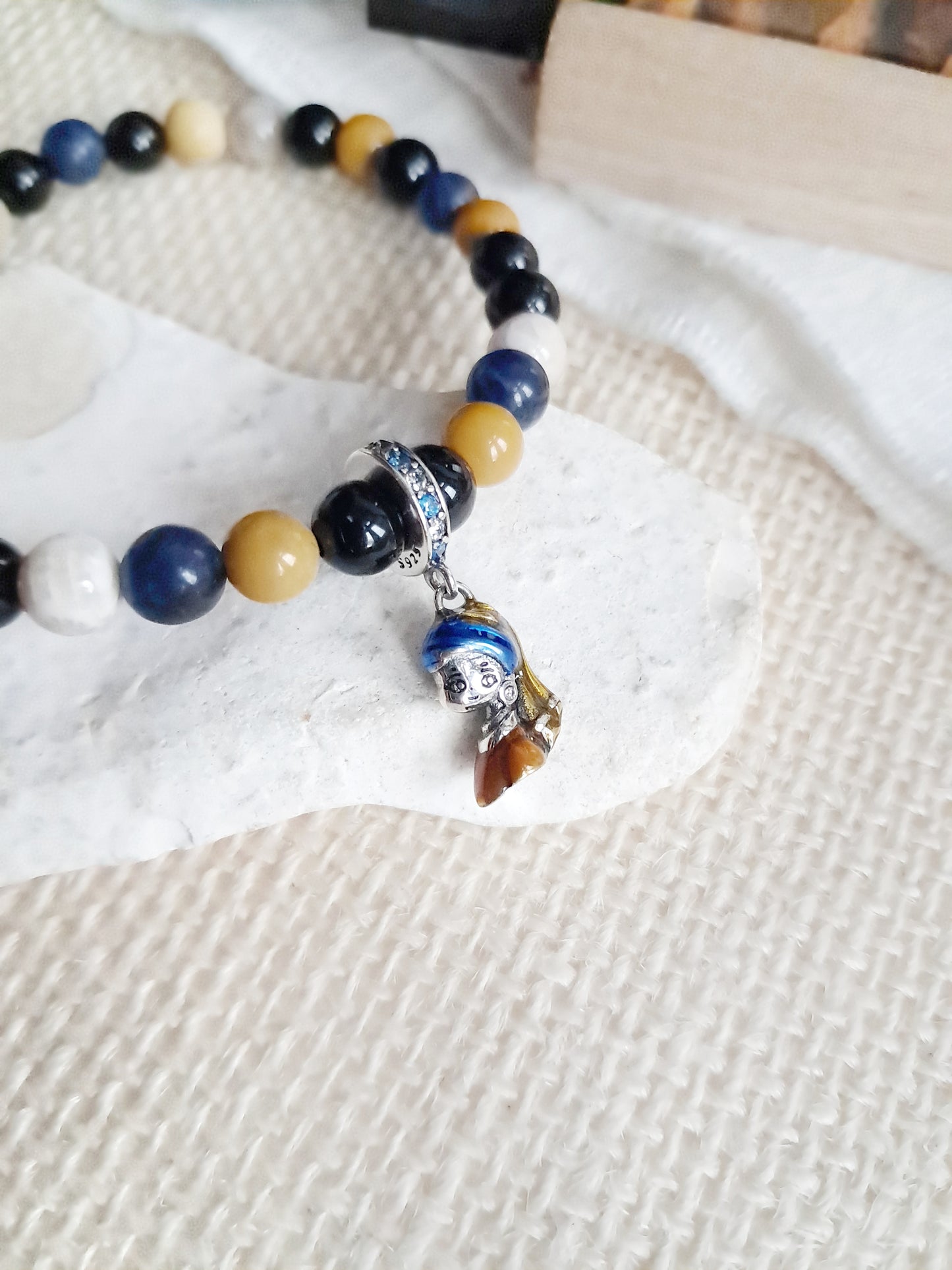 Bracelet inspired by the work “The Girl with a Pearl Earring” by Johannes Vermeer 