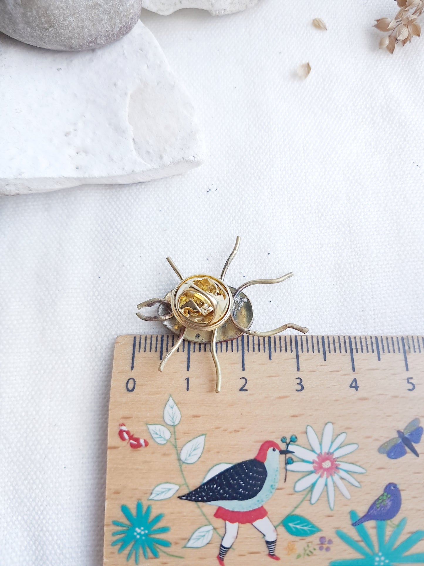 Pin's coccinelle en laiton