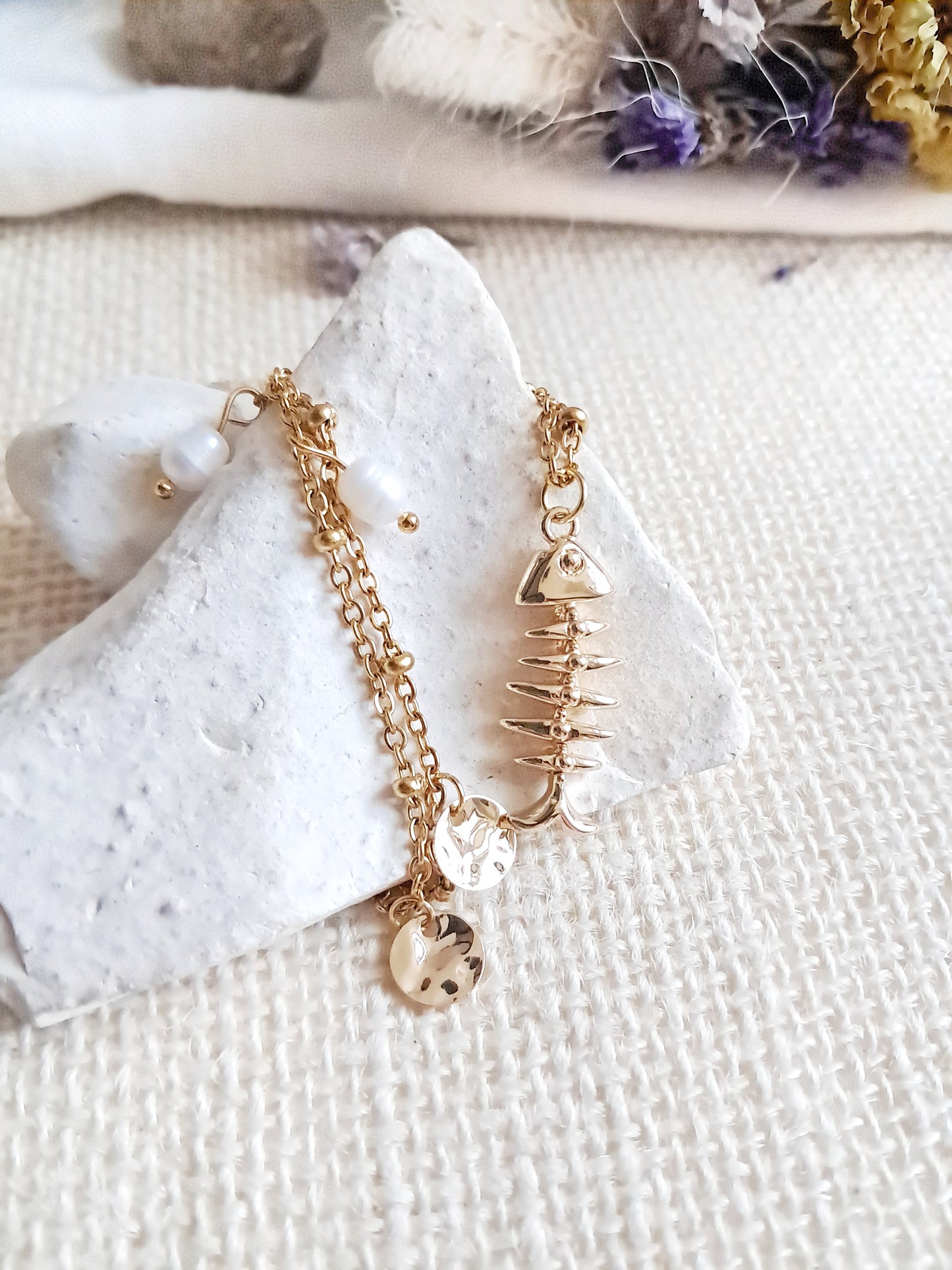 Collier arrêtes de poisson articulé