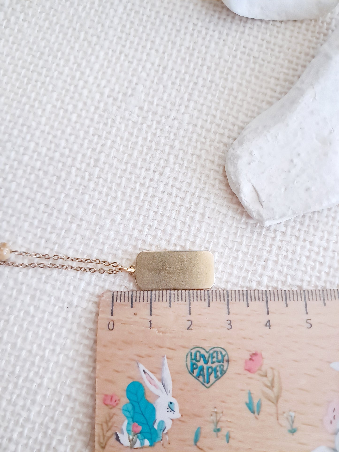 Collier plaque soleil et lune en acier inoxydable doré