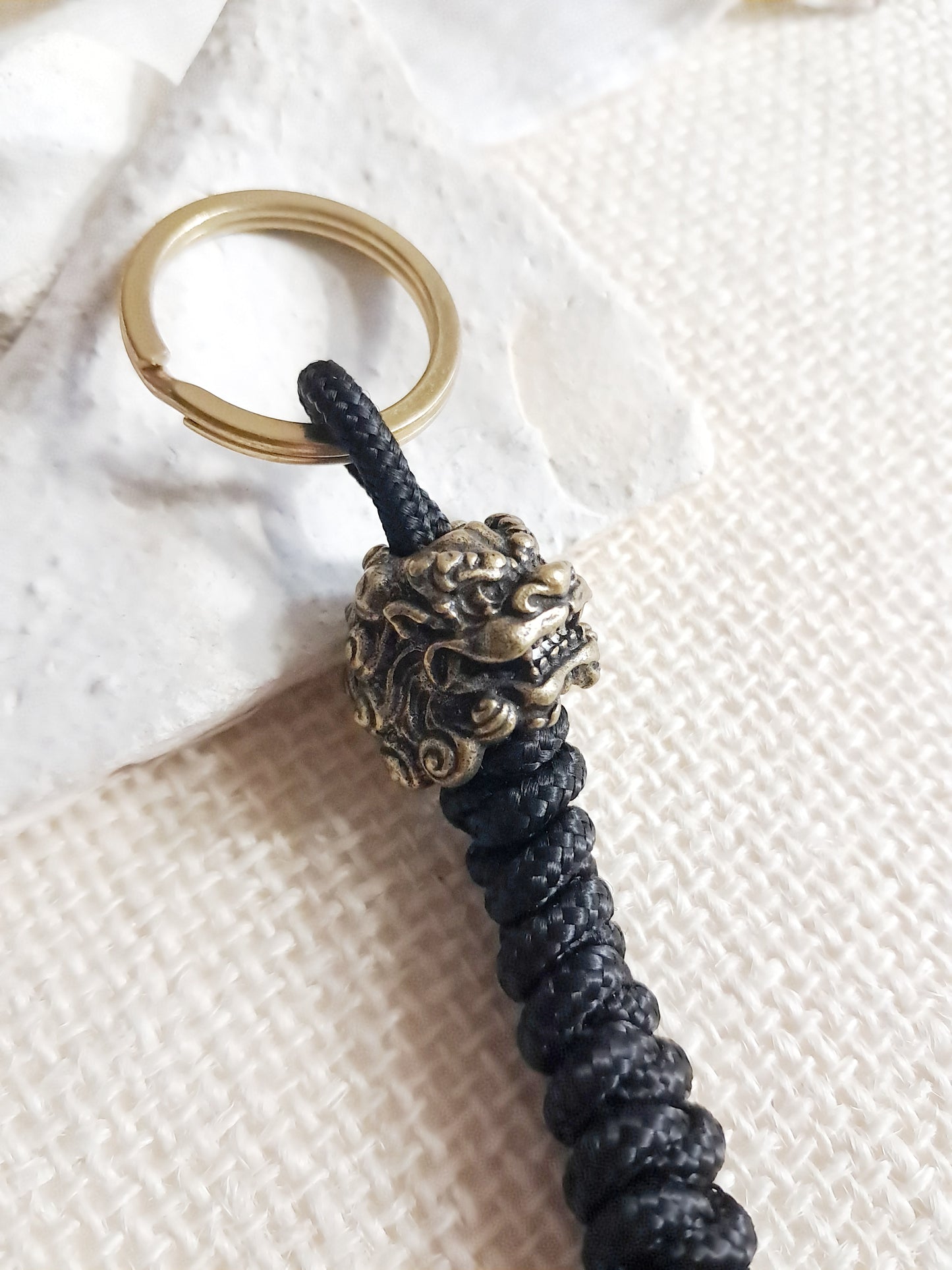 Porte-clés lion chinois en laiton