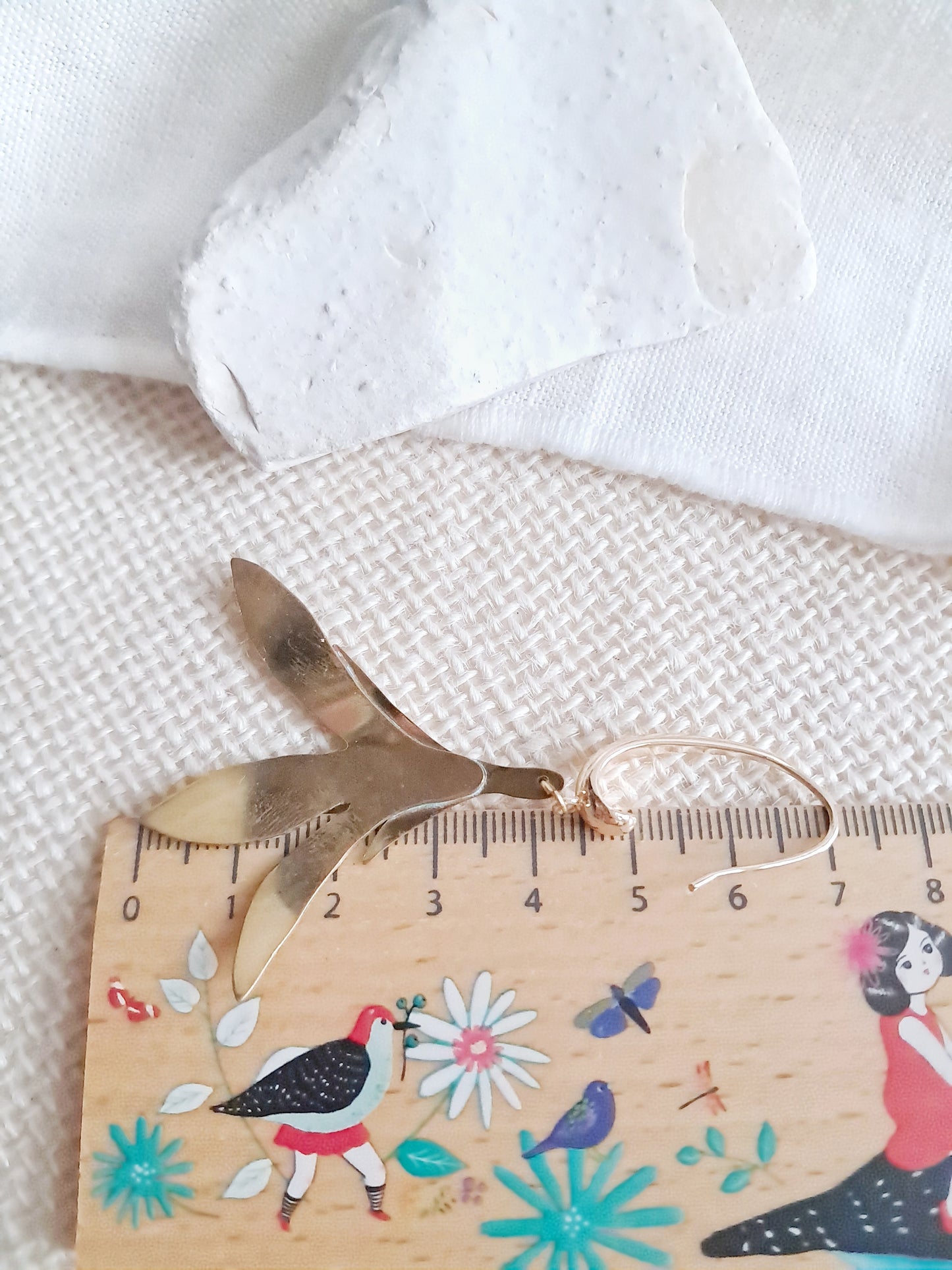 Boucles d'oreilles fleurs de lys en laiton