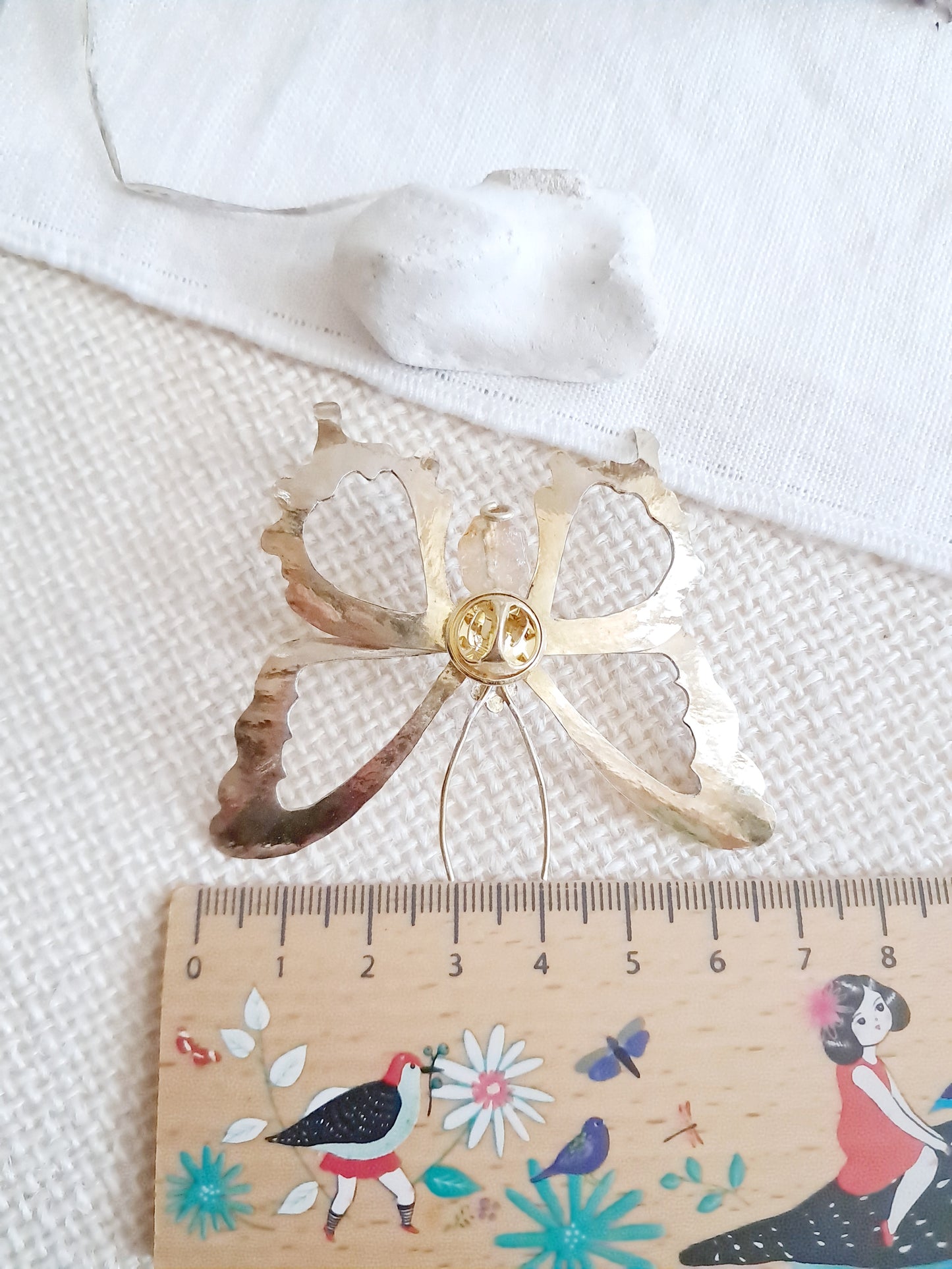 Pin's papillon en laiton et citrine