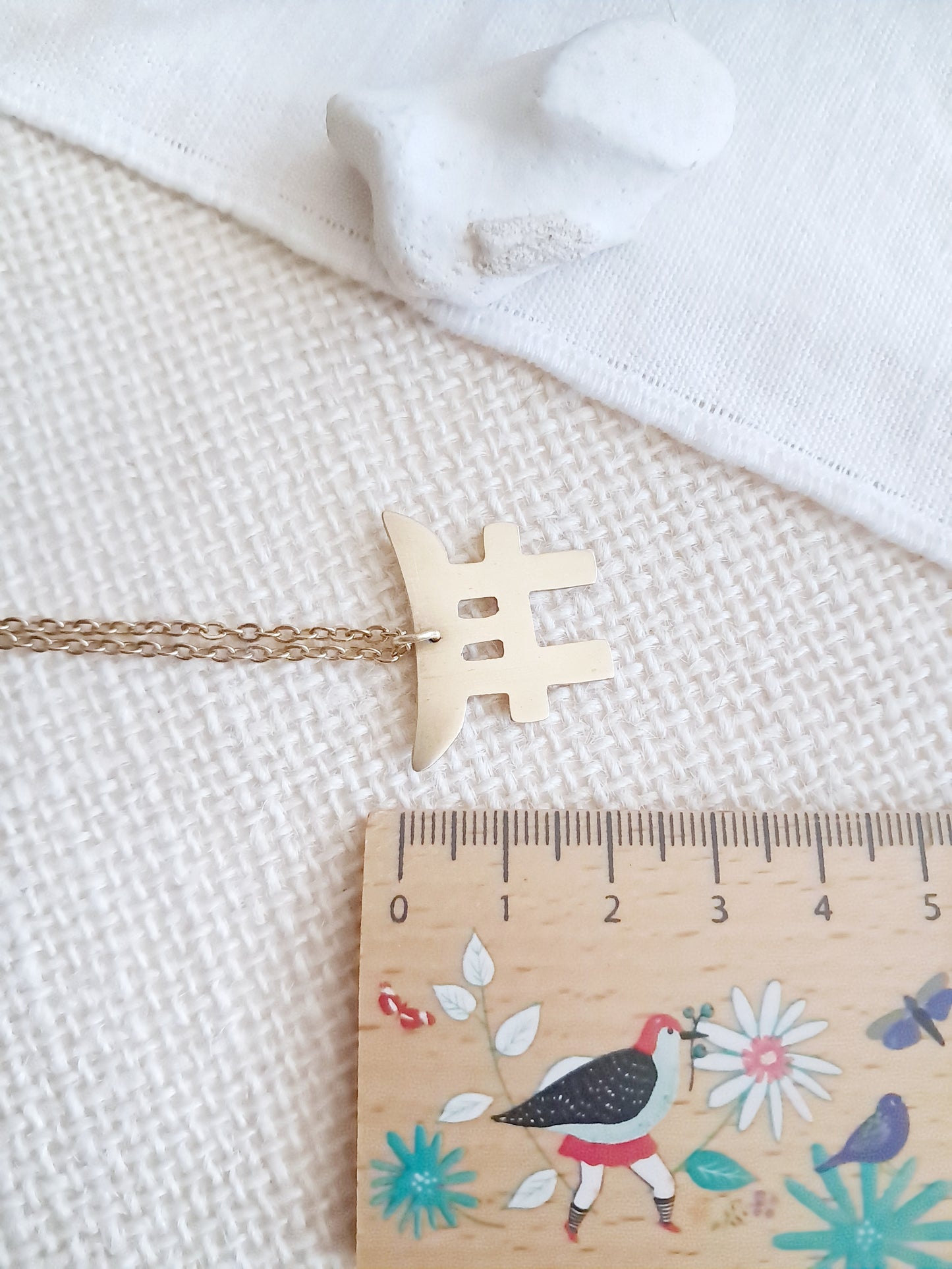 Collier torii en laiton