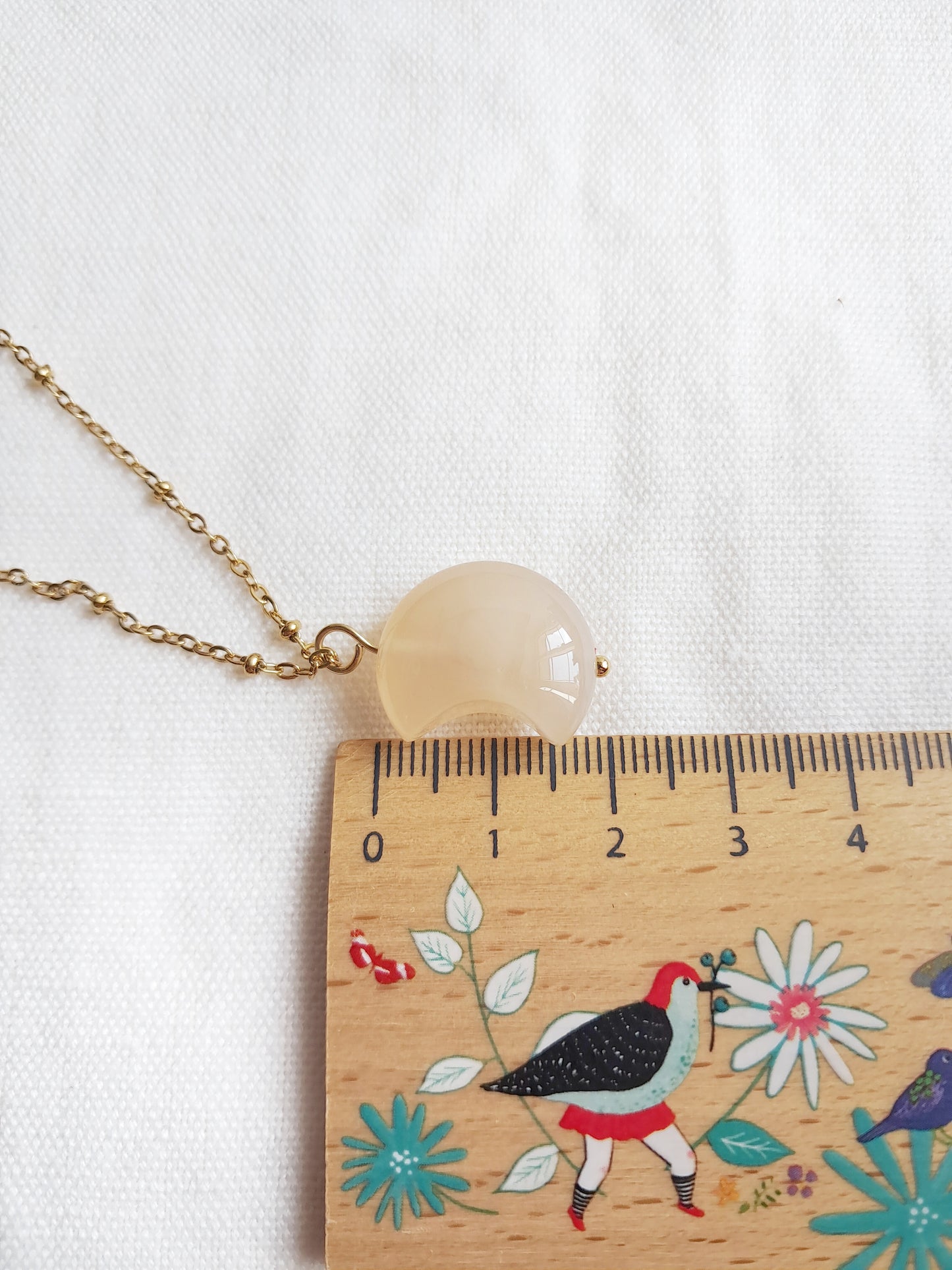 Collier lune en agate et inoxydable doré