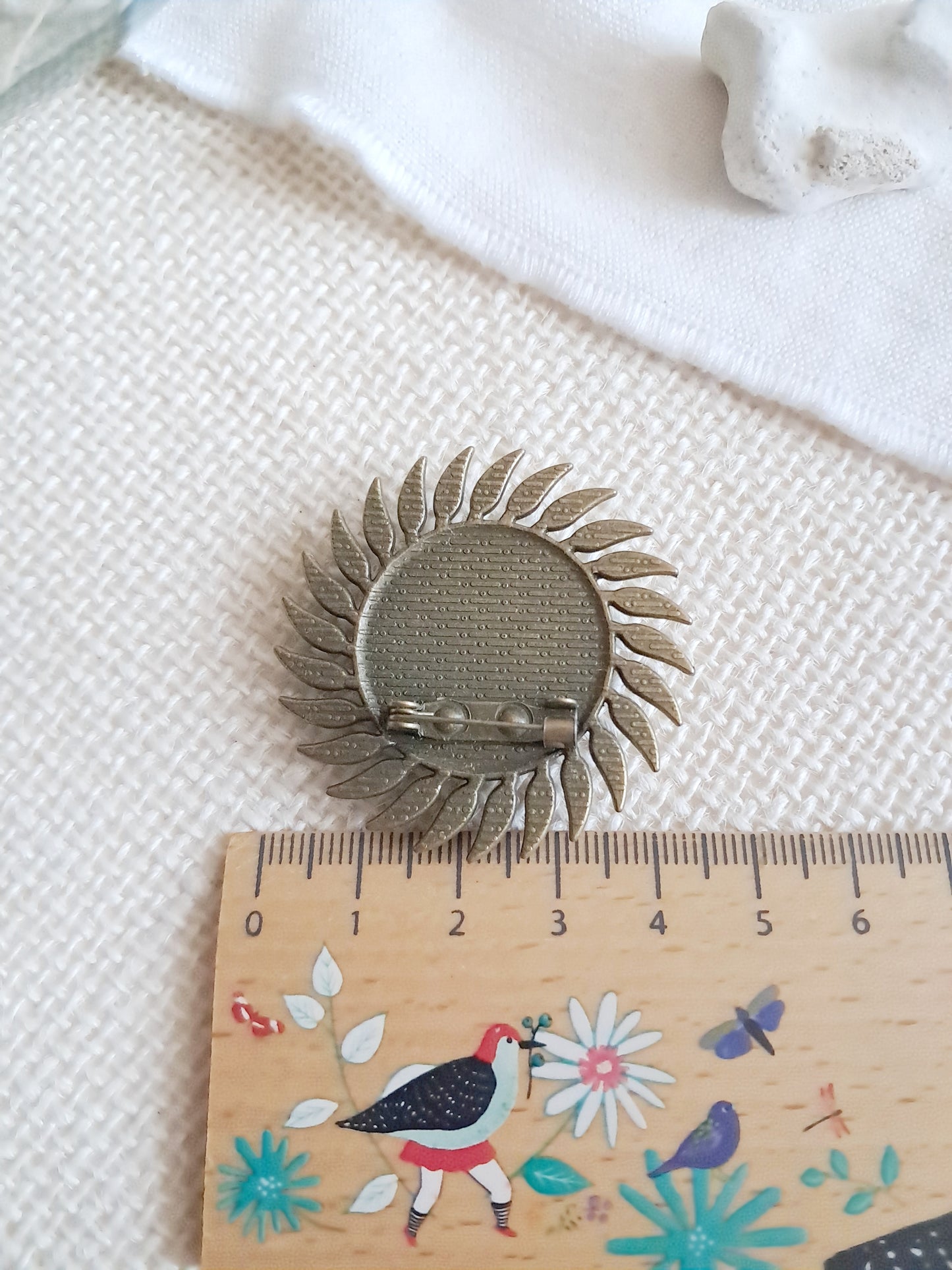 Broche cabochon flamant rose