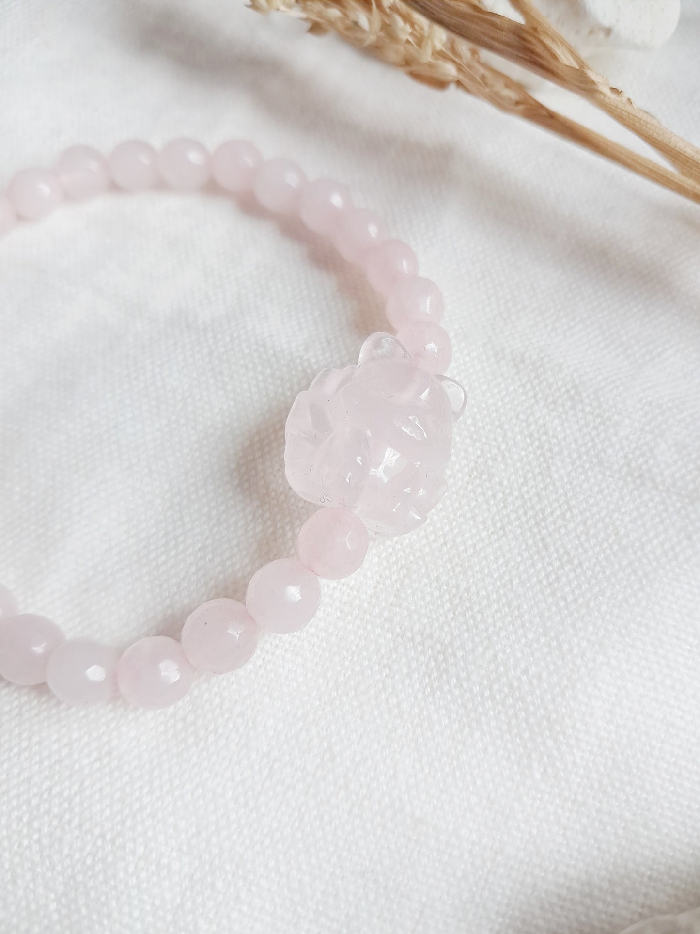 Bracelet renard à neuf queues en quartz rose à facettes