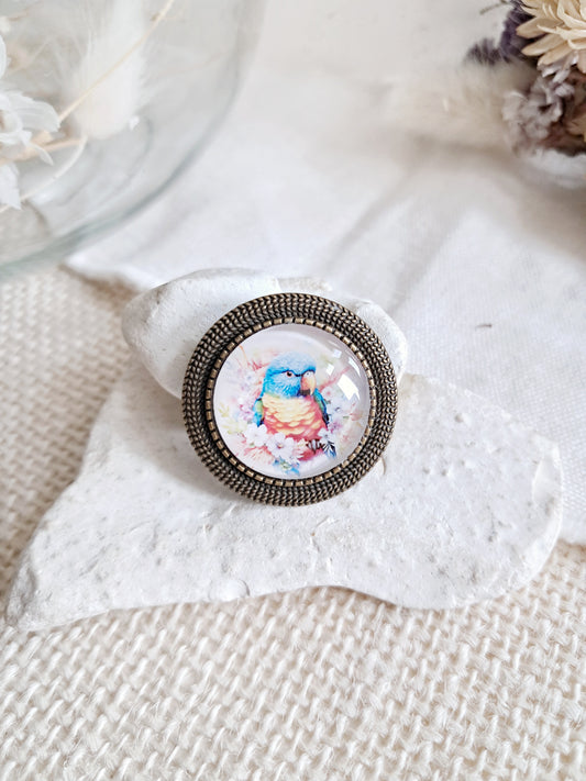Broche cabochon perroquet