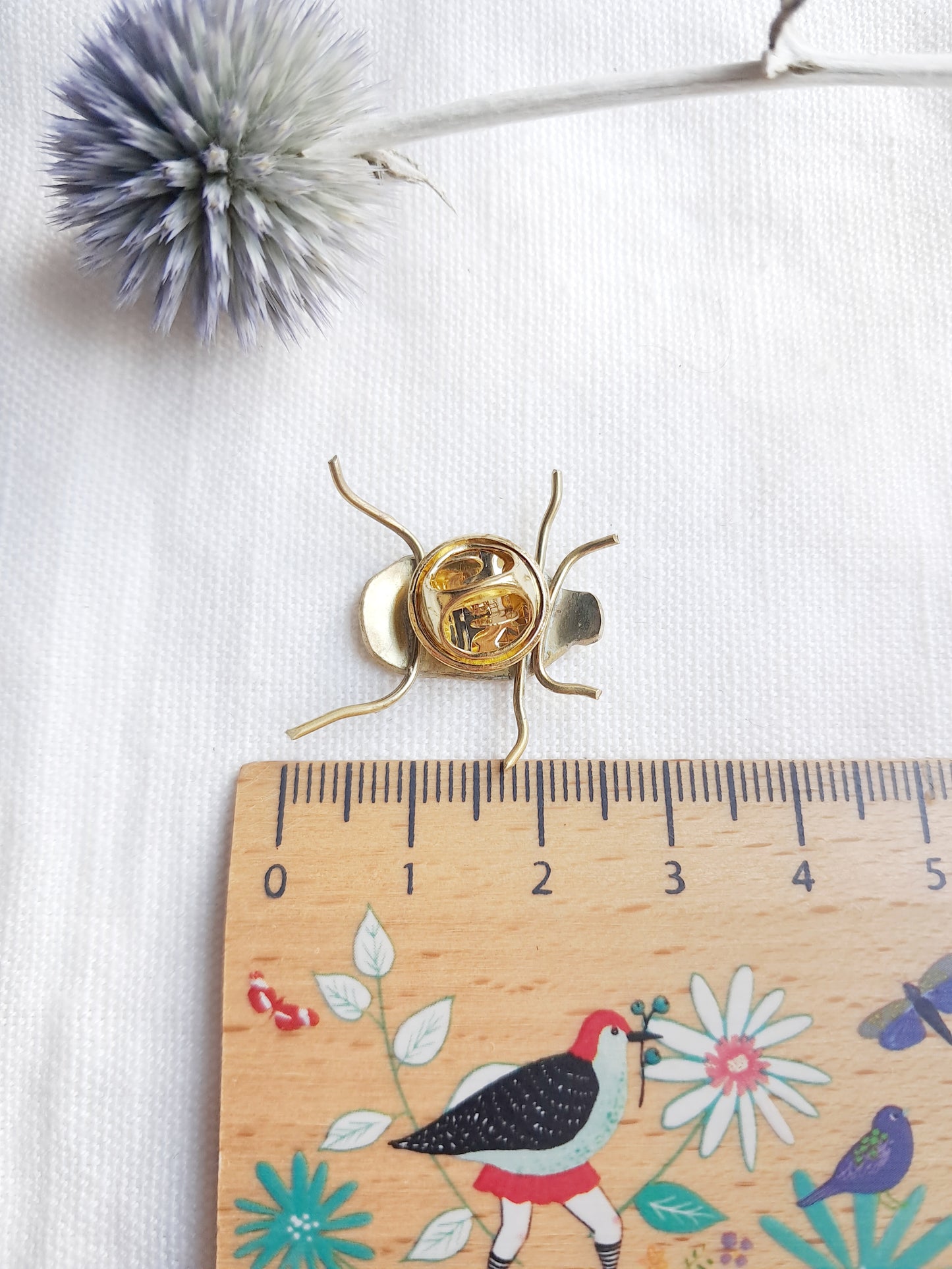 Pin's scarabée en laiton