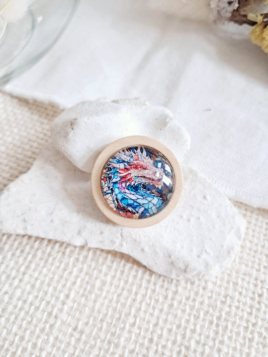 Broche dragon en bois