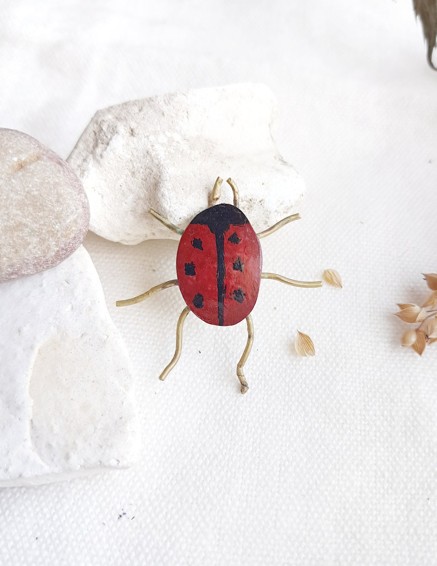 Pin's coccinelle en laiton