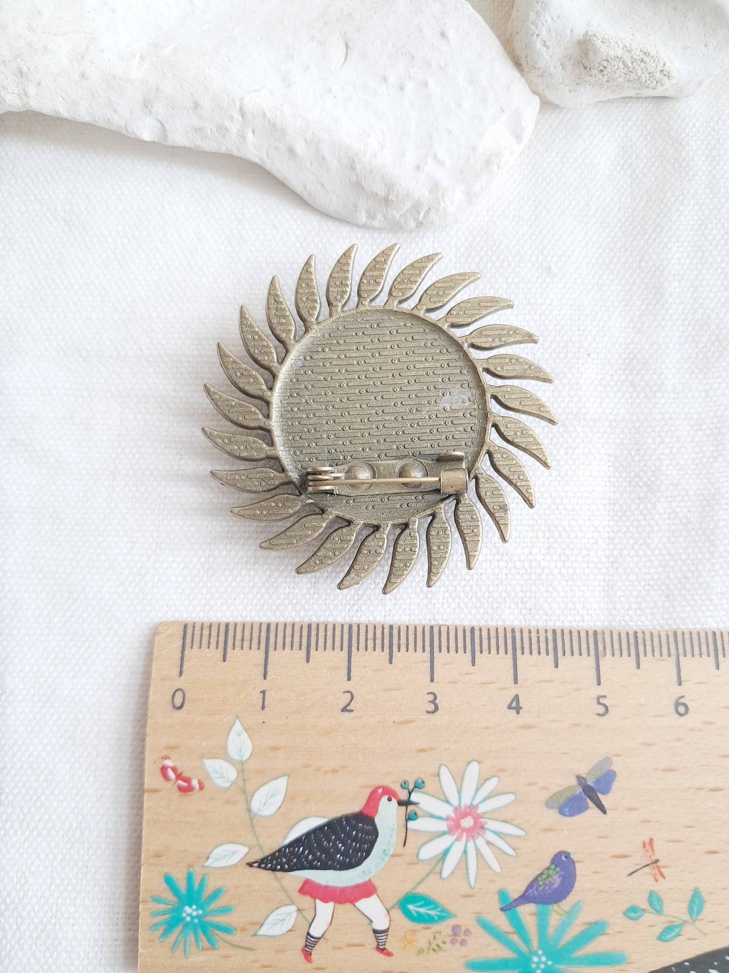 Broche cabochon fleur de gypsophile